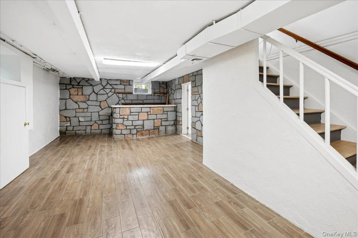 The basement. Not shown is an additional room, bath, garage and storage. The basement. Not shown is an additional room, bath, garage and storage.