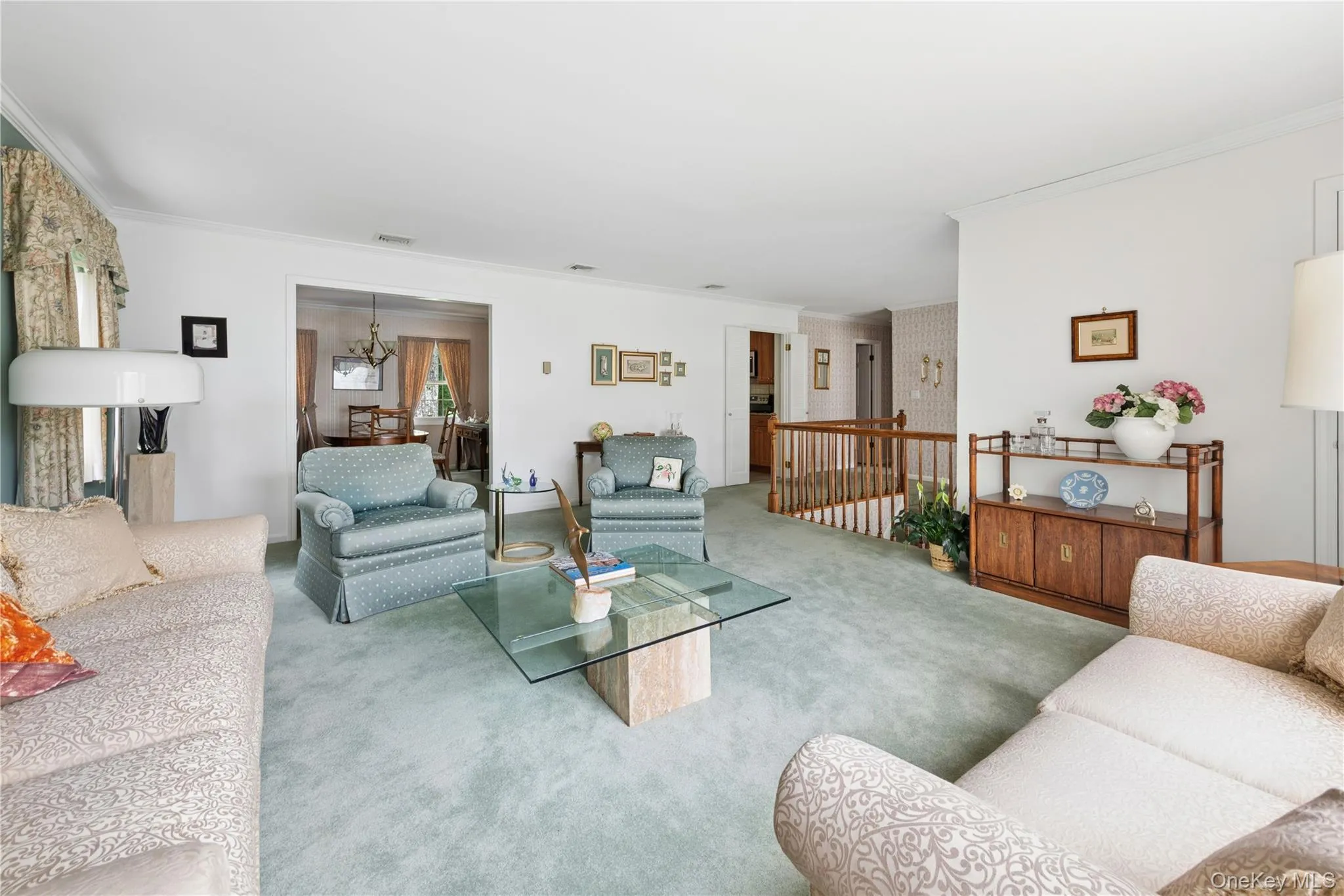 Living Room with View of Dining Room (hardwood floors under carpet) Living Room with View of Dining Room (hardwood floors under carpet)