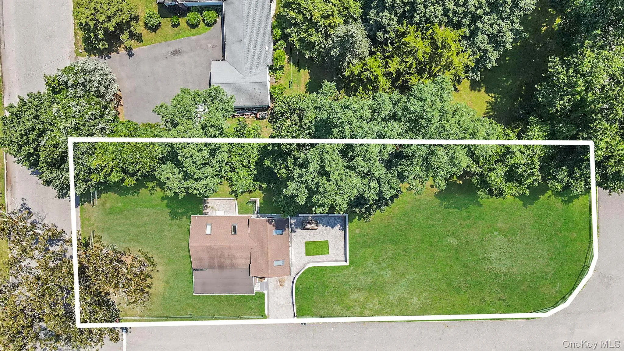 Aerial overview of property's location with property boundaries highlighted Aerial overview of property's location with property boundaries highlighted