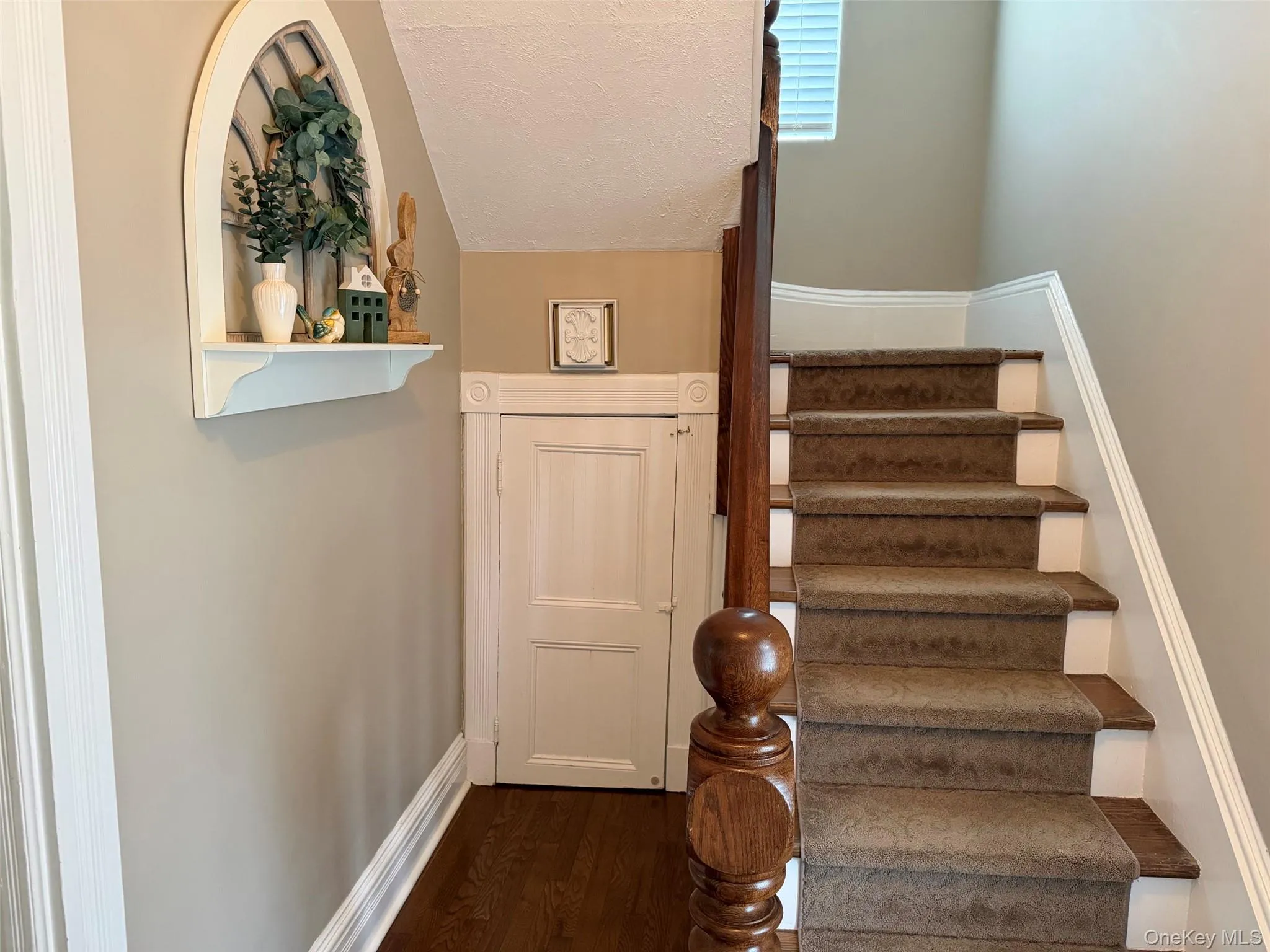 Foyer when first entering the home with stairway to upstairs bedrooms. Foyer when first entering the home with stairway to upstairs bedrooms.