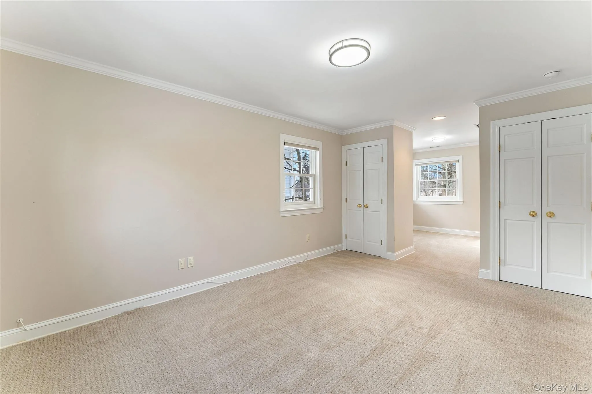 Primary bedroom with 3 closets, bonus room and ensuite bathroom Primary bedroom with 3 closets, bonus room and ensuite bathroom