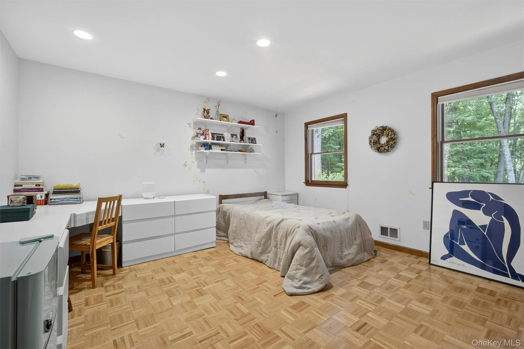 Bedroom featuring recessed lighting and an office area Bedroom featuring recessed lighting and an office area