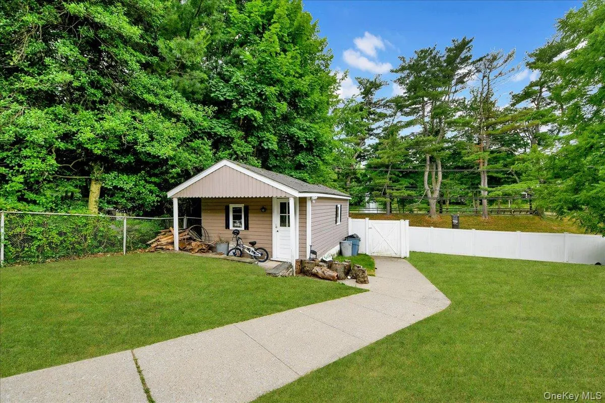 Detached garage accessed by street behind property. Detached garage accessed by street behind property.