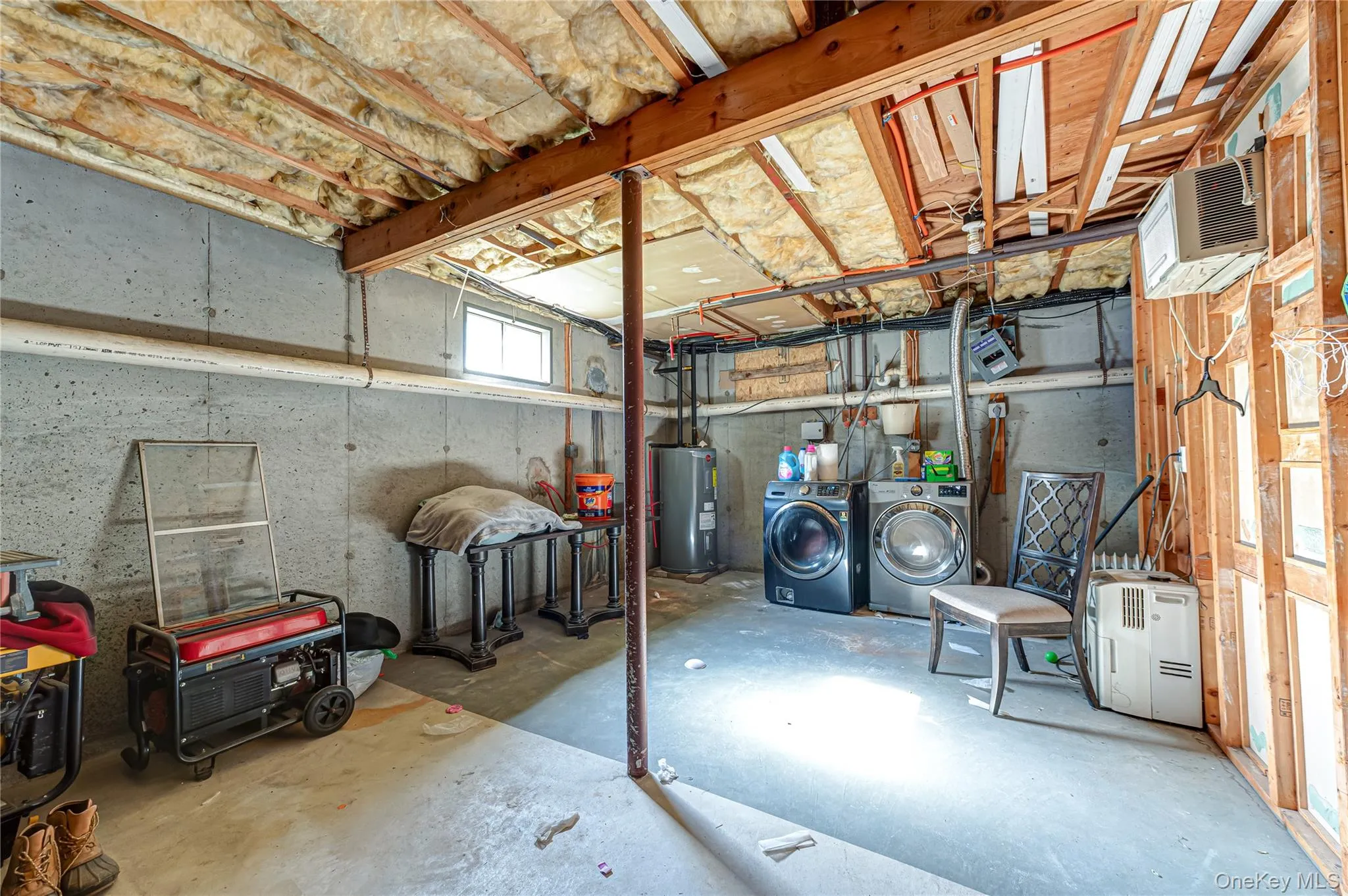 Unfinshed Basement with High Ceilings ad Washer/Dryer Unfinshed Basement with High Ceilings ad Washer/Dryer