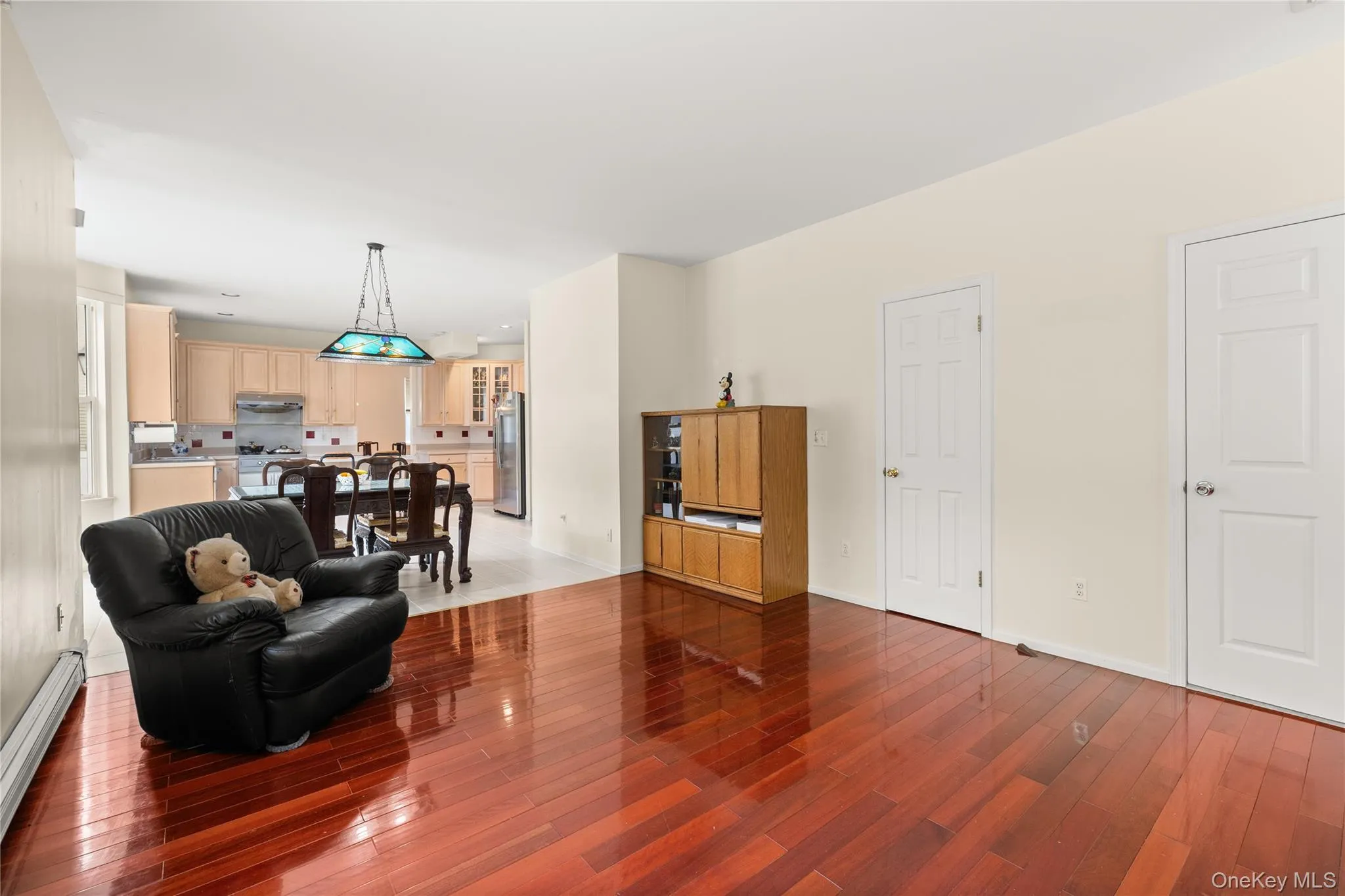 Family room with beautiful wood floors overlooking Eik Family room with beautiful wood floors overlooking Eik
