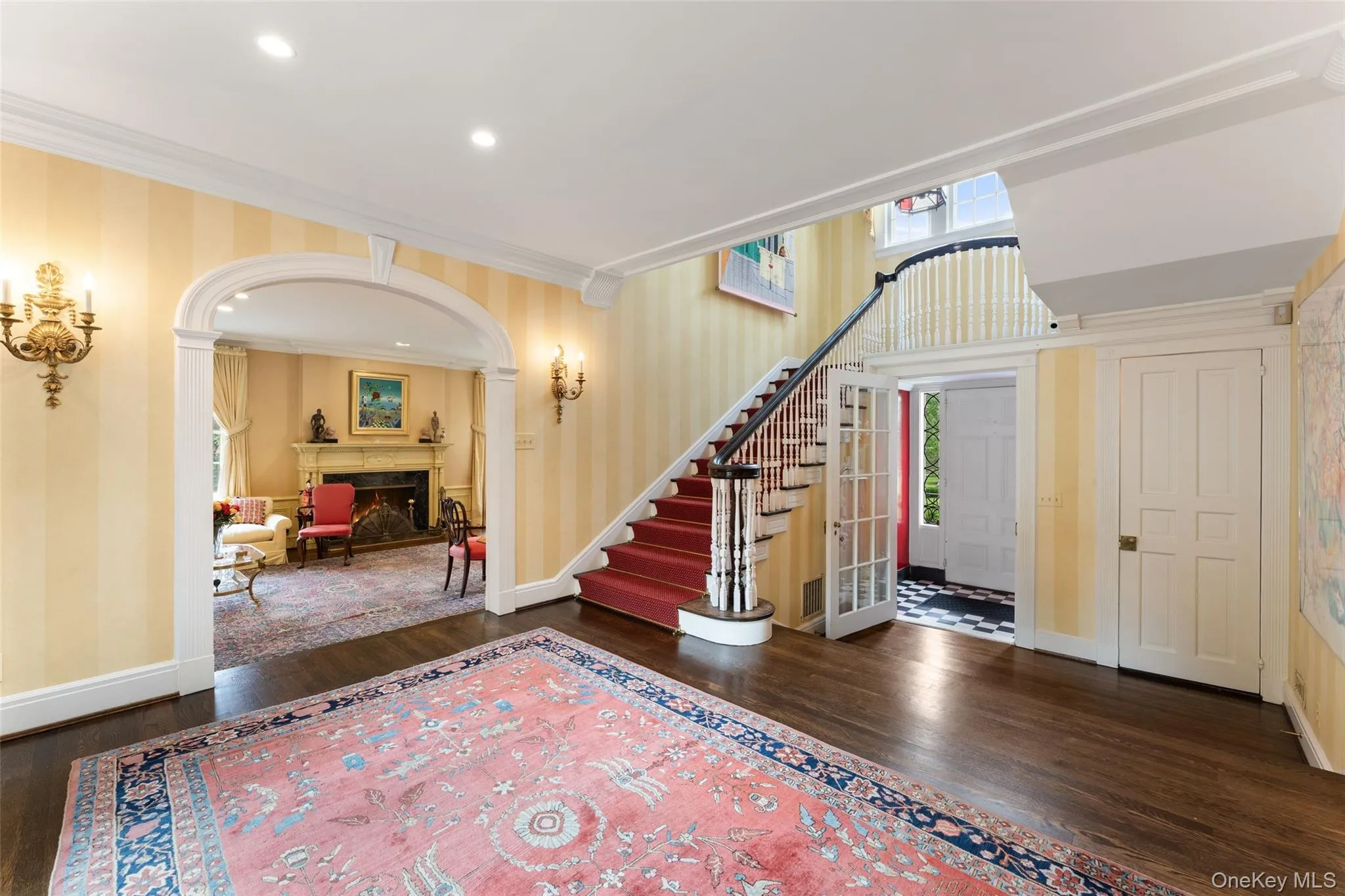 Foyer with view of curved staircase Foyer with view of curved staircase