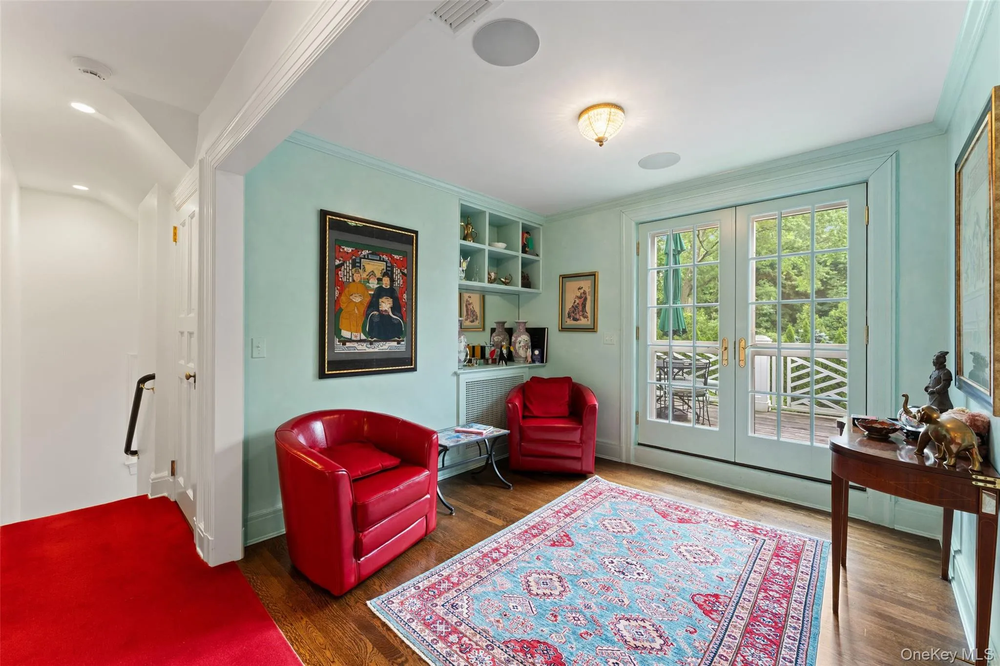 Sitting Room with french doors to second floor deck overlooking grounds Sitting Room with french doors to second floor deck overlooking grounds