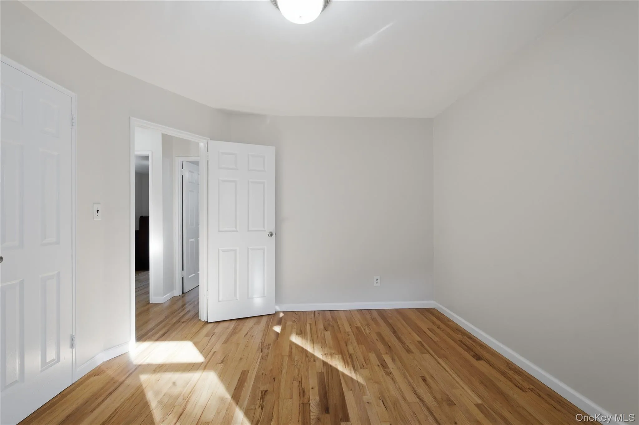 Room with hardwood flooring. Room with hardwood flooring.