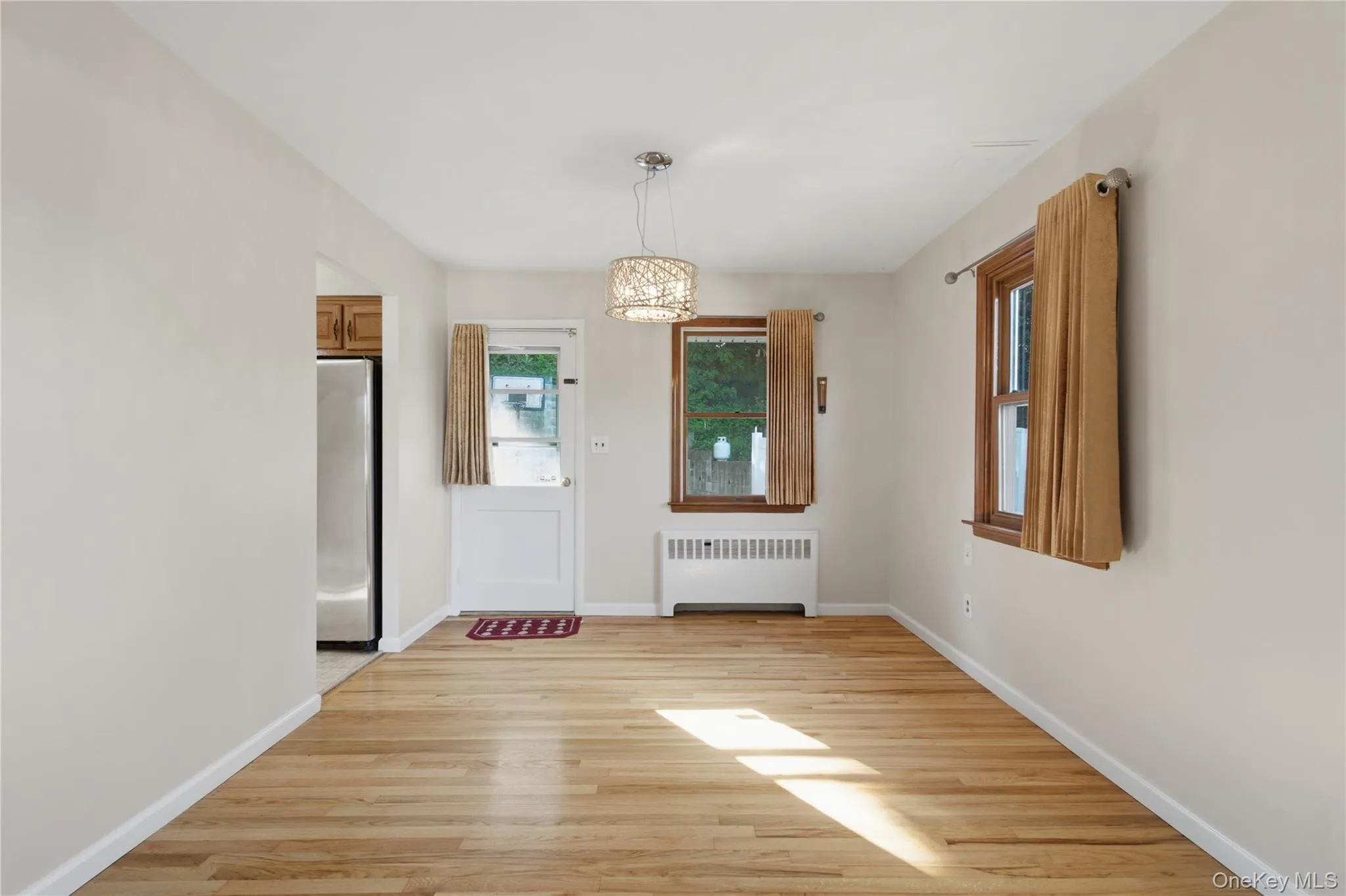 Dining area with hard wood floors. Dining area with hard wood floors.