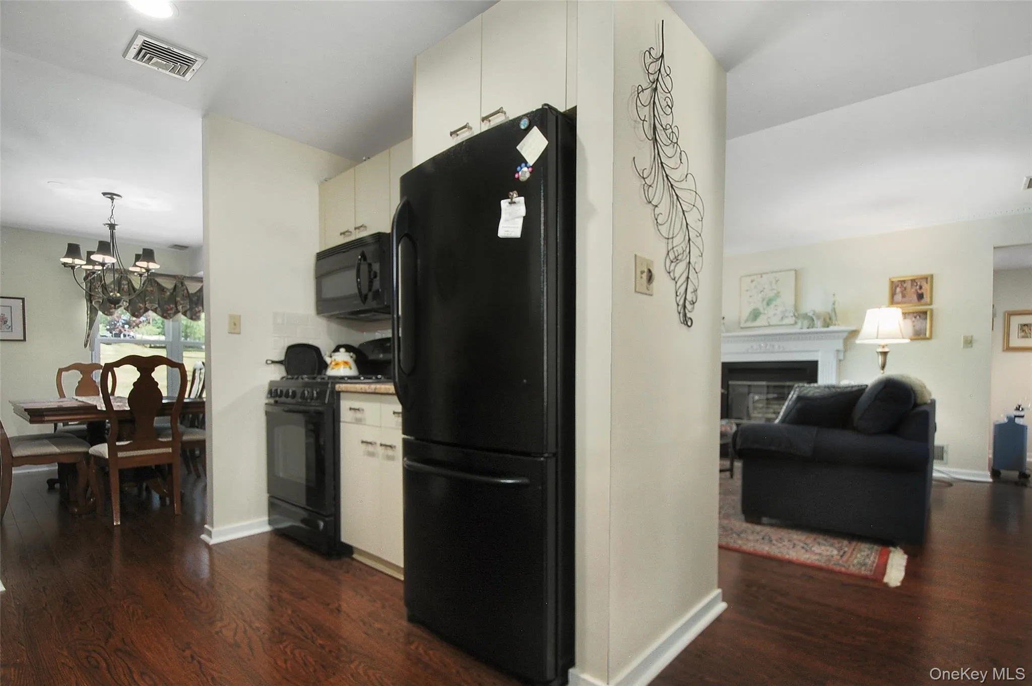 with view of living room & dining room with view of living room & dining room