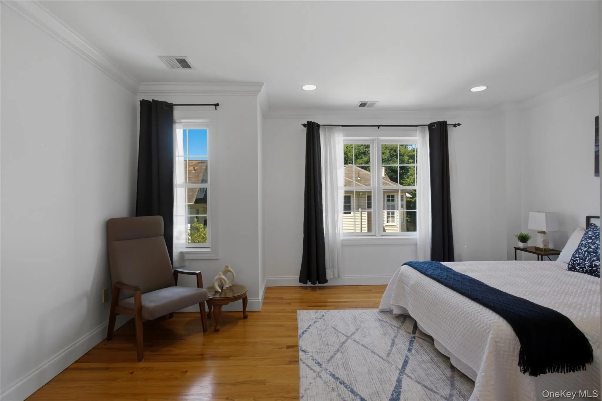 Spacious primary bedroom with ample closet space. Spacious primary bedroom with ample closet space.