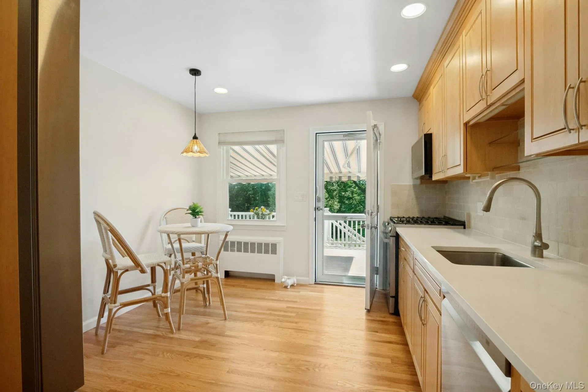 Bright and inviting new deck with new sun setter retractable awning out the kitchen door. Bright and inviting new deck with new sun setter retractable awning out the kitchen door.