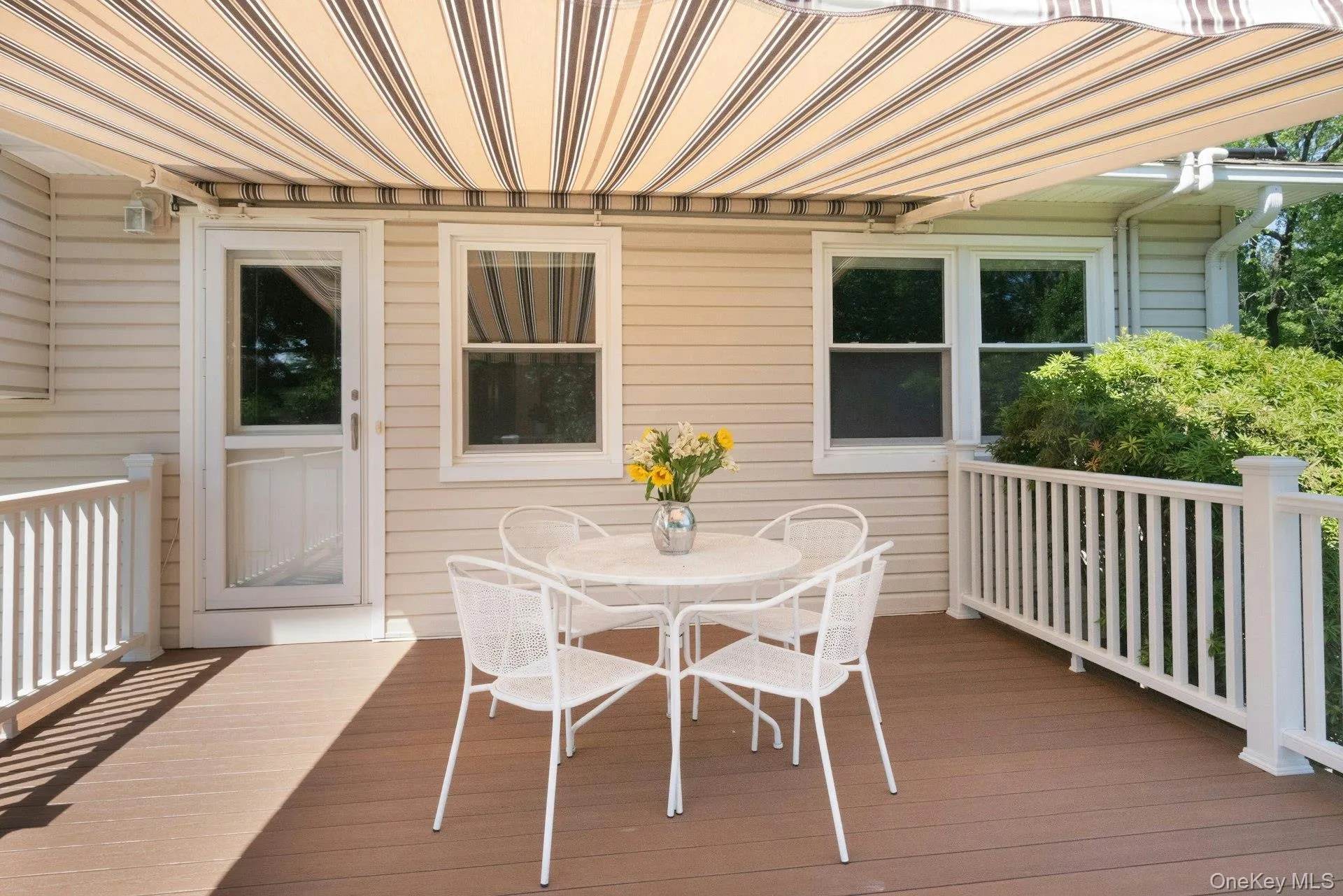 Plenty of dining and entertaining possibilities on this beautiful deck leading down to patio and gardens. Plenty of dining and entertaining possibilities on this beautiful deck leading down to patio and gardens.