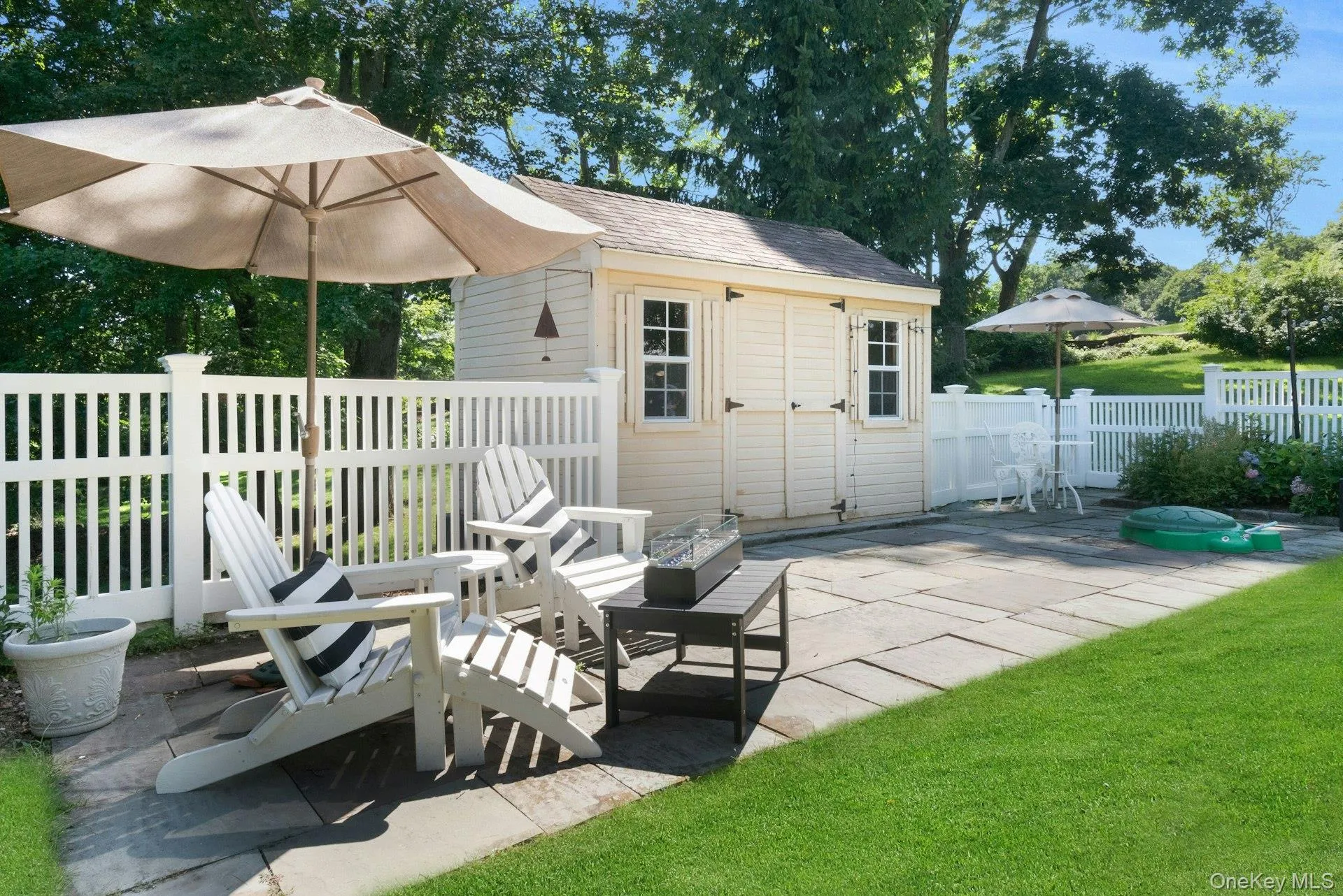 Convenient shed for storage also has a refrigerator to grab cool drinks. Convenient shed for storage also has a refrigerator to grab cool drinks.
