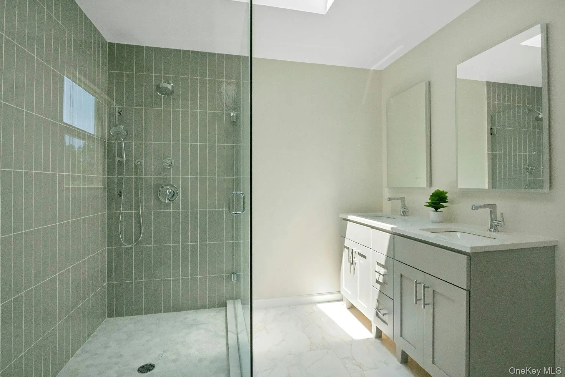 Looking at vanity from opposite side of bathroom. Looking at vanity from opposite side of bathroom.