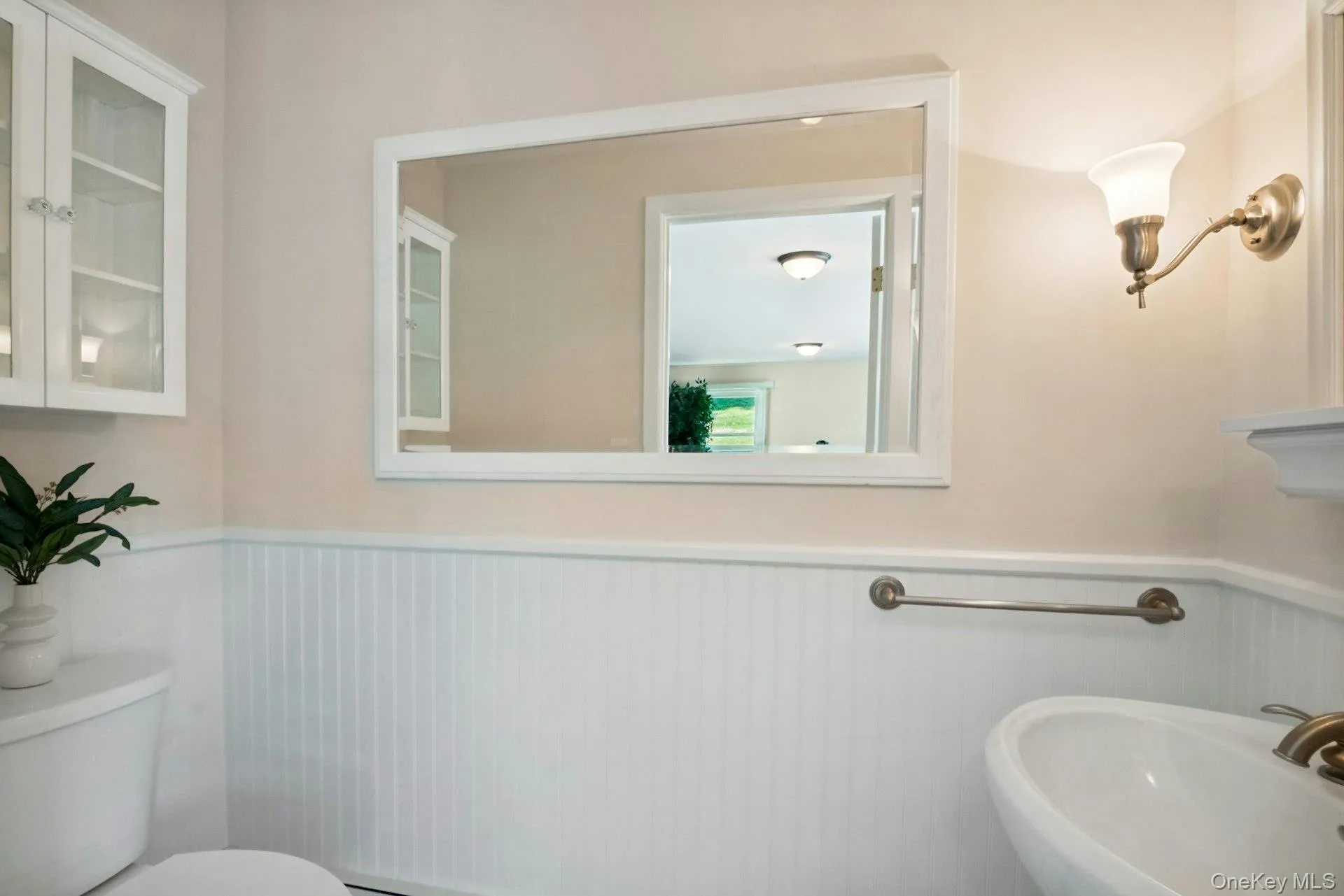 Convenient half bath right off family room. Convenient half bath right off family room.