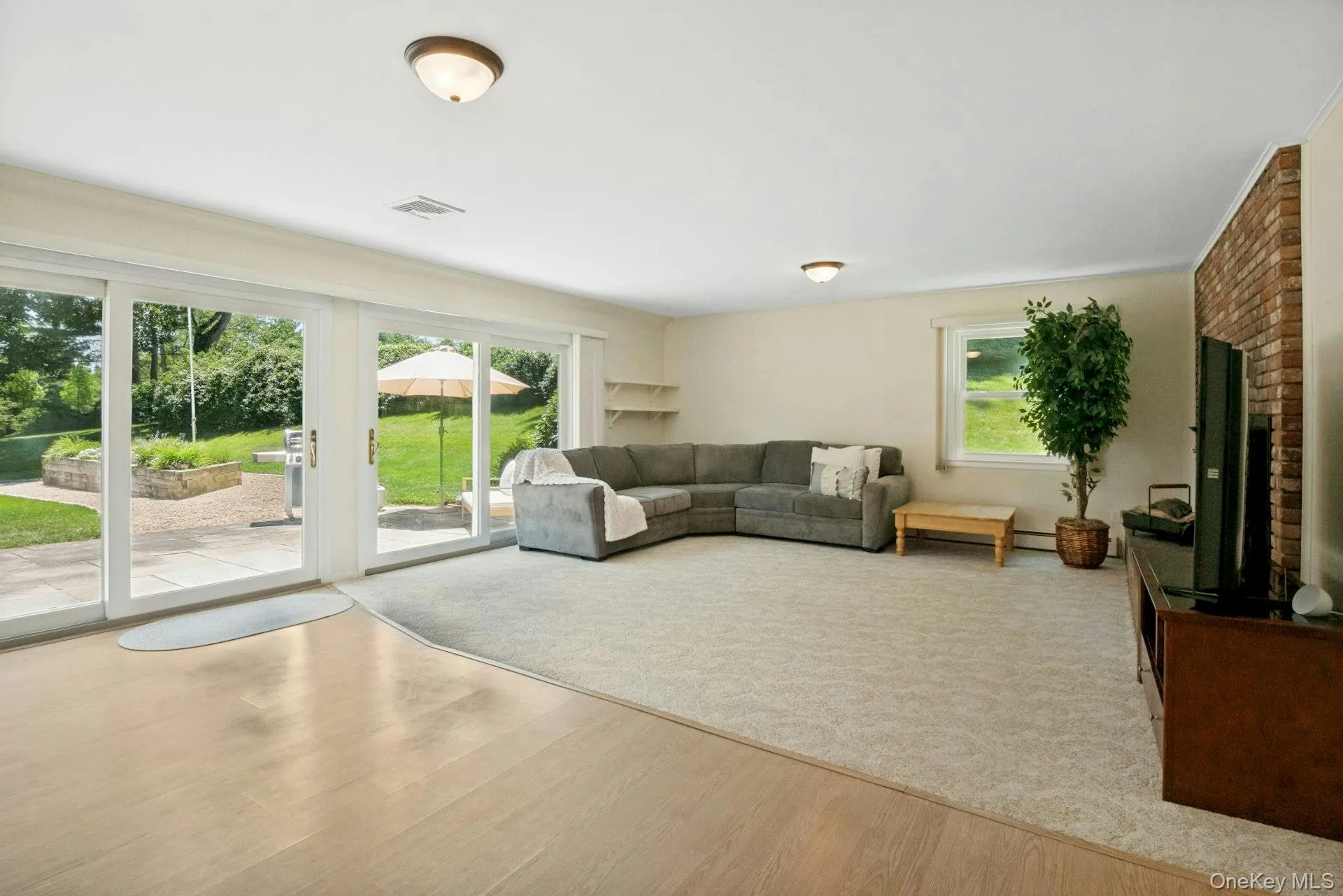 The heart of the home with fireplace and perfect flow to outside fun. The heart of the home with fireplace and perfect flow to outside fun.