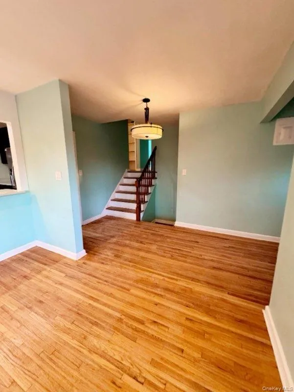 Unfurnished room with light hardwood / wood-style flooring Unfurnished room with light hardwood / wood-style flooring