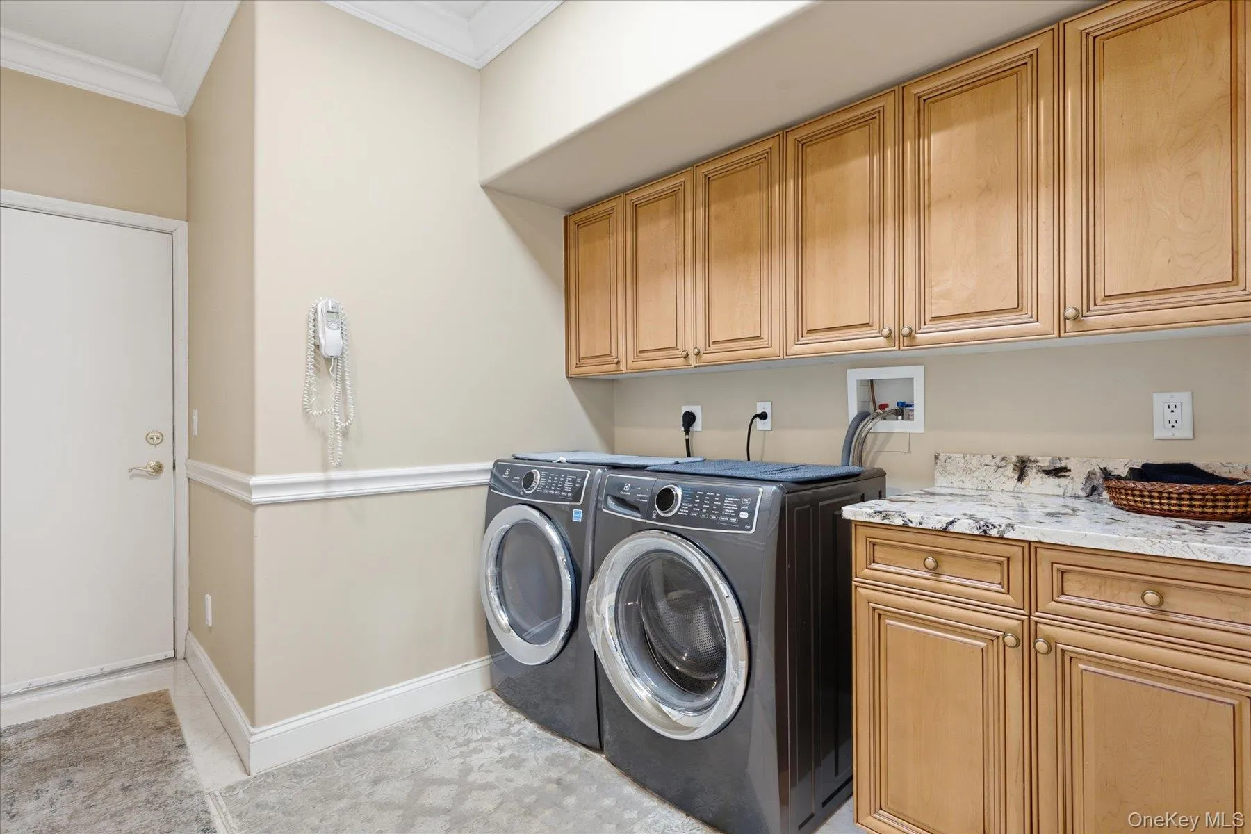 Laundry room and entrance into Garage Laundry room and entrance into Garage