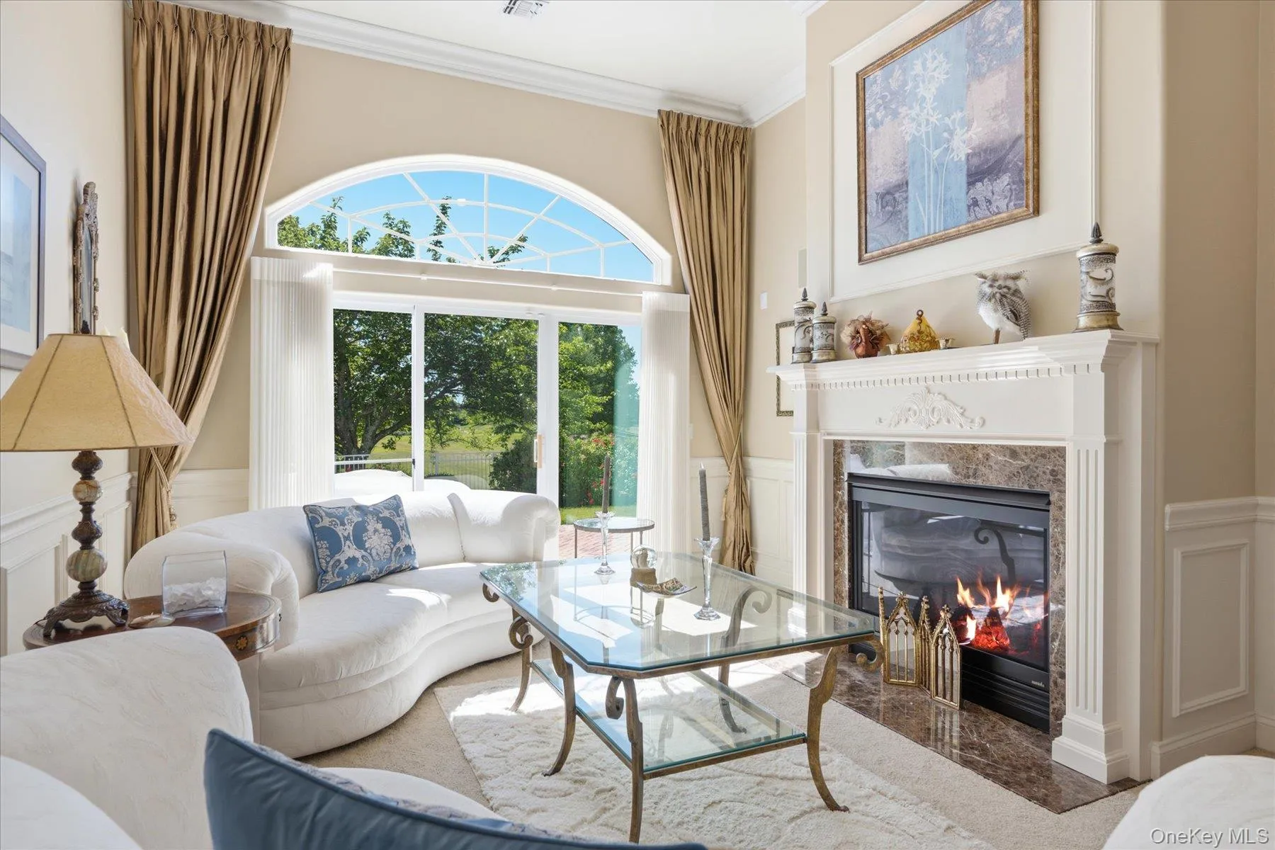 Beautiful Formal Living Room with gas fireplace and view of Golf Course Beautiful Formal Living Room with gas fireplace and view of Golf Course