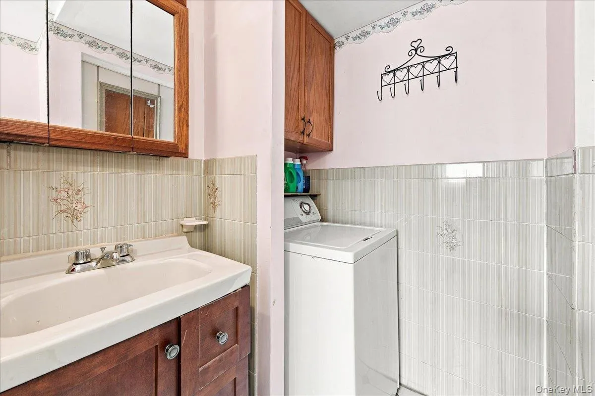 Bathroom with wash machine. Bathroom with wash machine.
