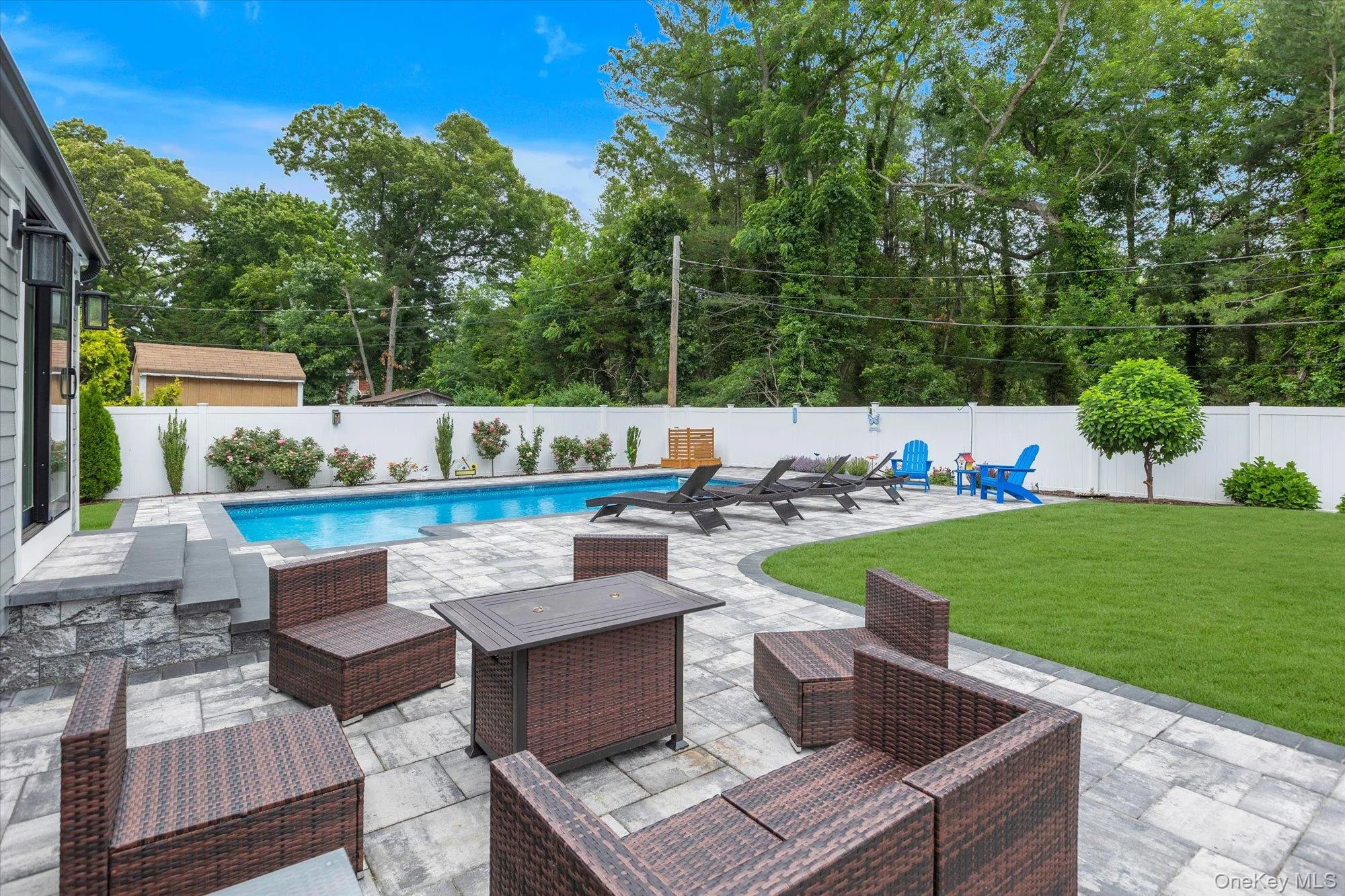 Beautiful stone pavers lead to pool area. Beautiful stone pavers lead to pool area.