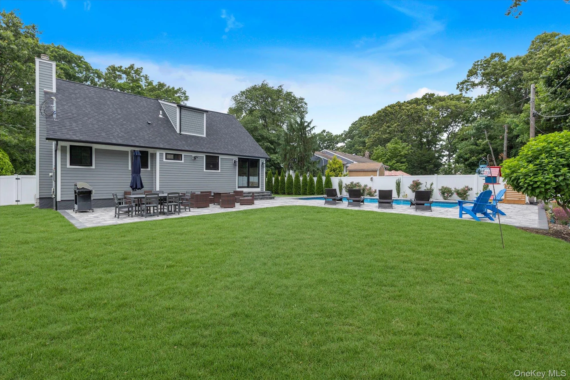 Backyard has plenty of grass area beside the patio. Backyard has plenty of grass area beside the patio.