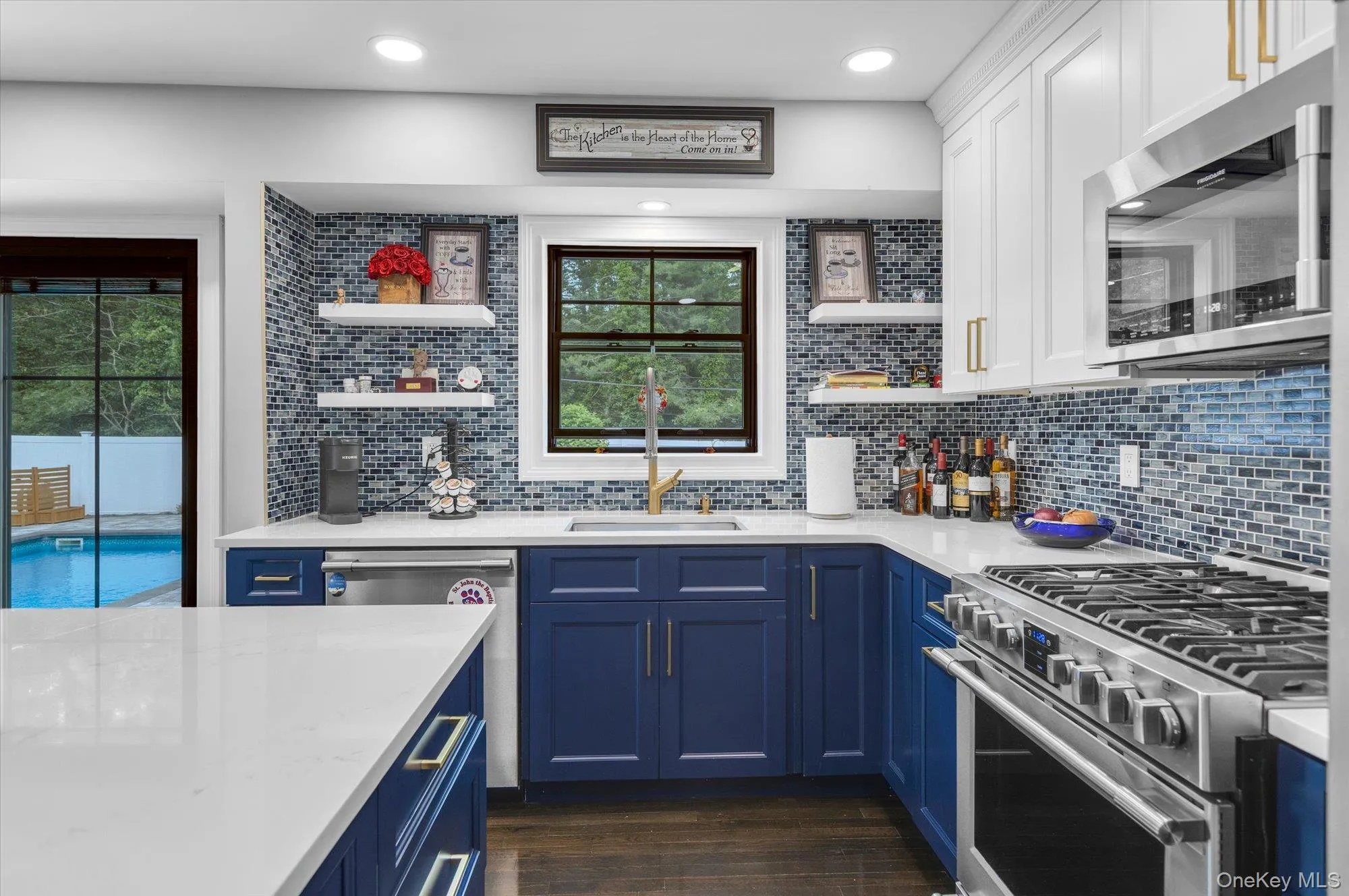 Completely renovated with beautiful modern cabinetry. Stone countertops and counter to ceiling tile backsplash. Completely renovated with beautiful modern cabinetry. Stone countertops and counter to ceiling tile backsplash.