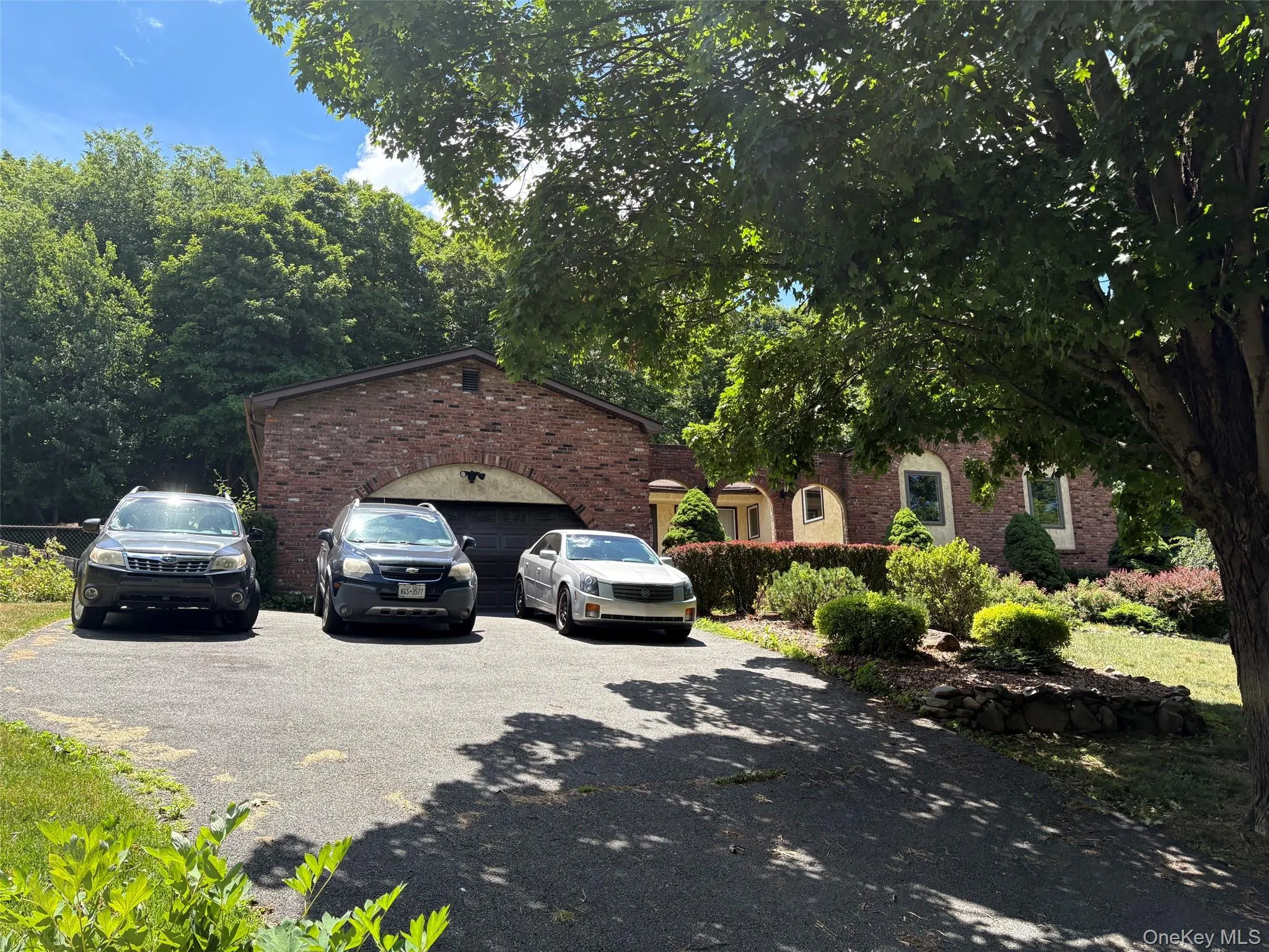 There is a garage and parking on the driveway There is a garage and parking on the driveway