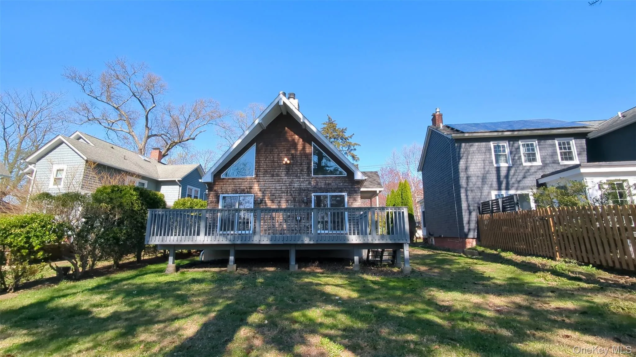 Perfect for entertaining. Expansive backyard, oversized rear deck with 2 sliding glass doors to the open concept livng area. Perfect for entertaining. Expansive backyard, oversized rear deck with 2 sliding glass doors to the open concept livng area.