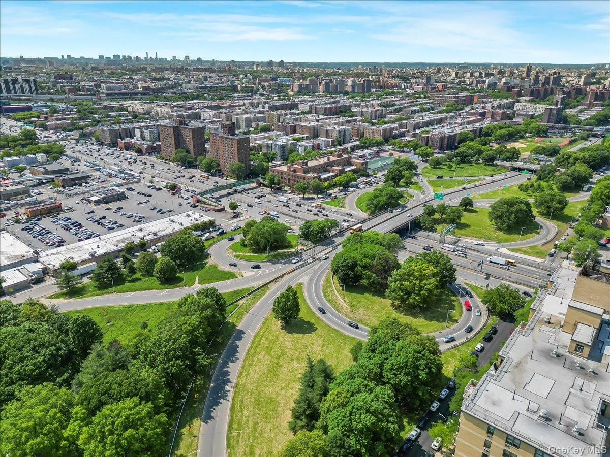 View of urban area with a main thoroughfare View of urban area with a main thoroughfare