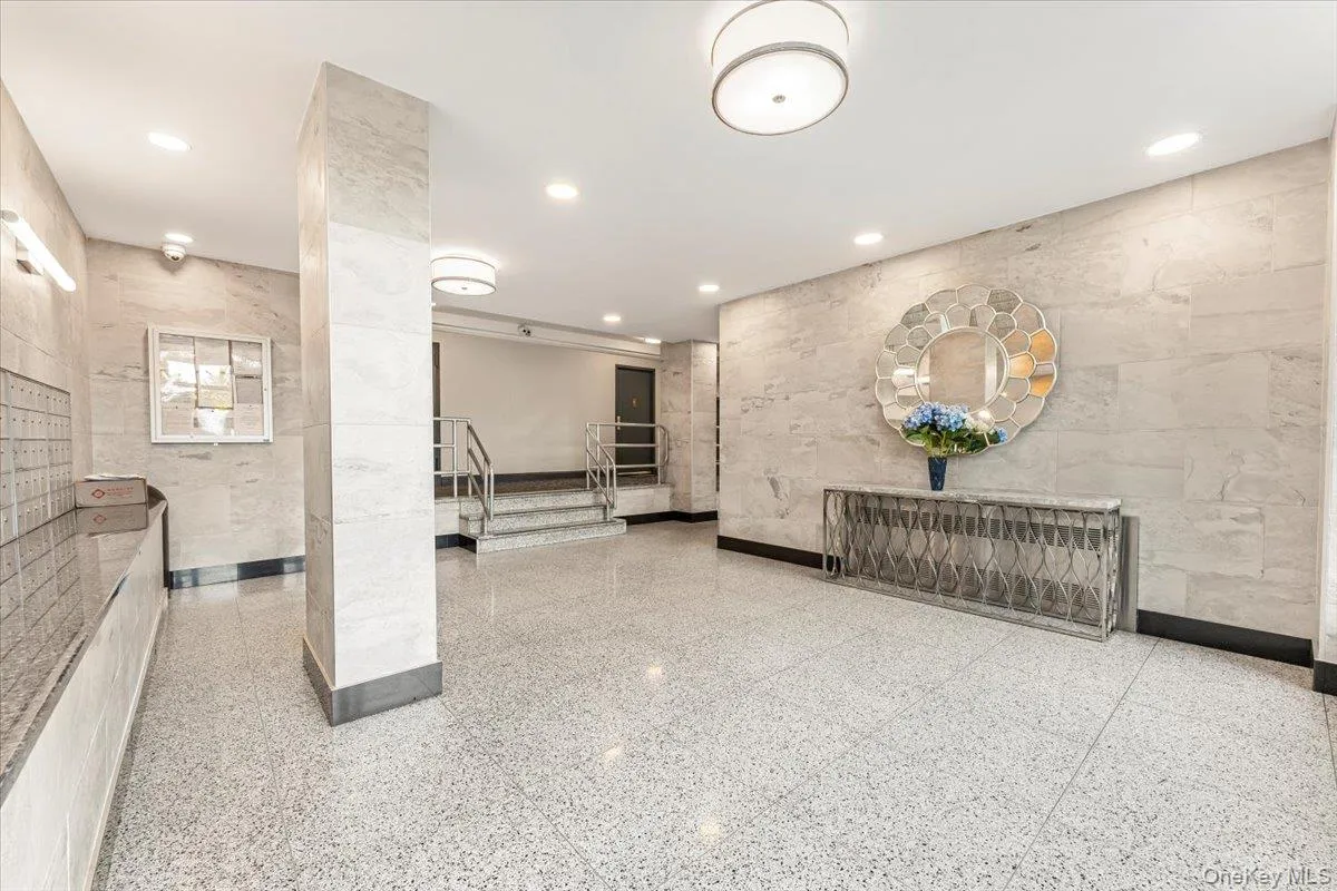 Common area featuring stairway and recessed lighting Common area featuring stairway and recessed lighting