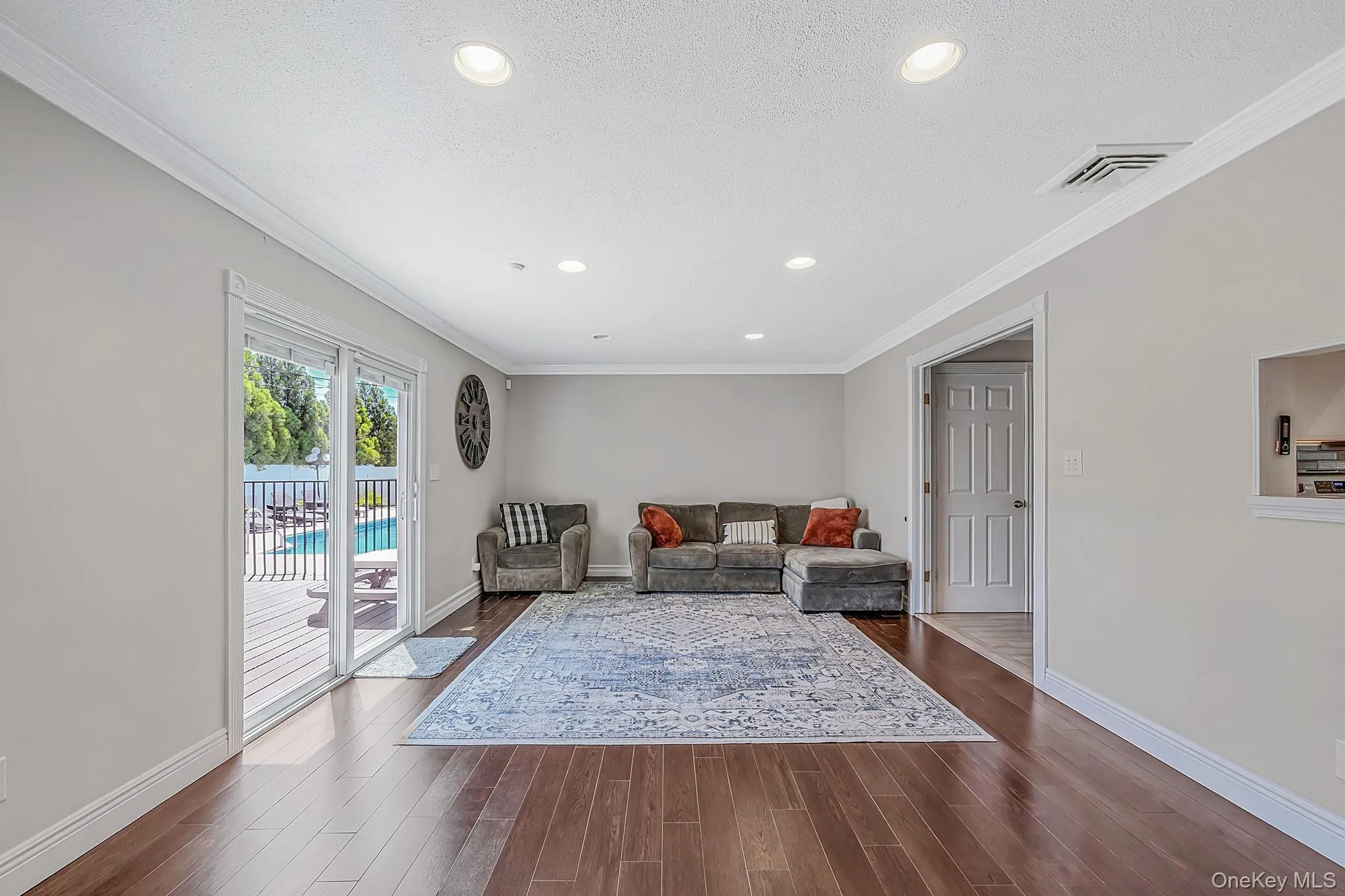 Main Level LR with Recessed Lighting, Crown Molding Sliders to Backyard Main Level LR with Recessed Lighting, Crown Molding Sliders to Backyard