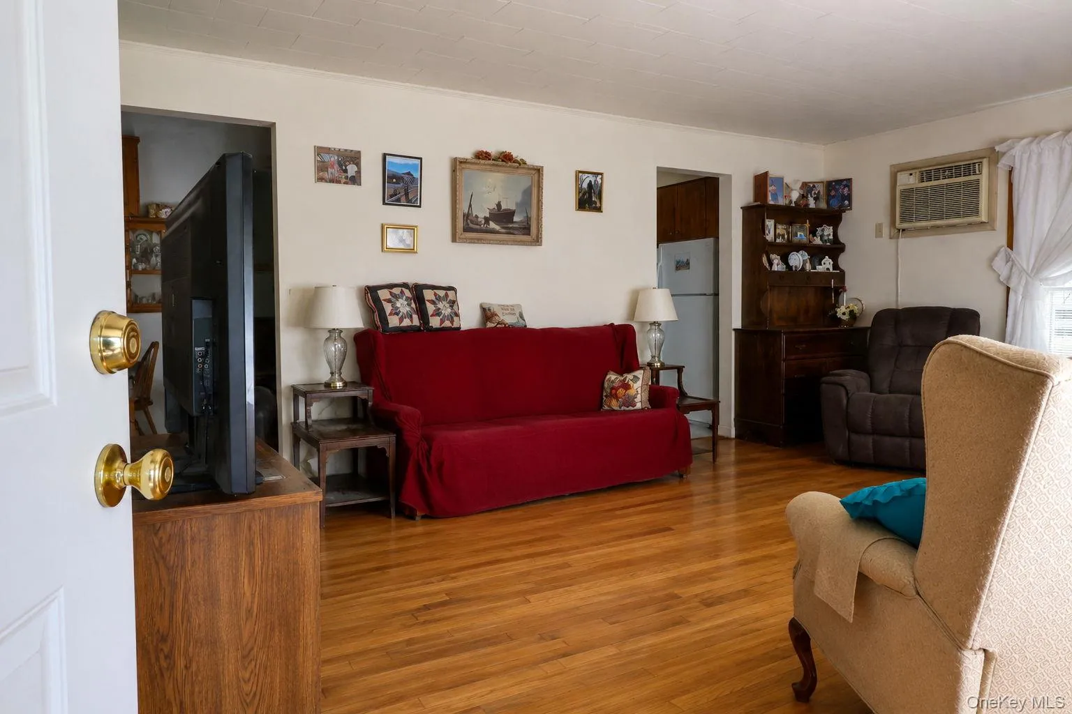 Hardwood flooring spans the main living area Hardwood flooring spans the main living area