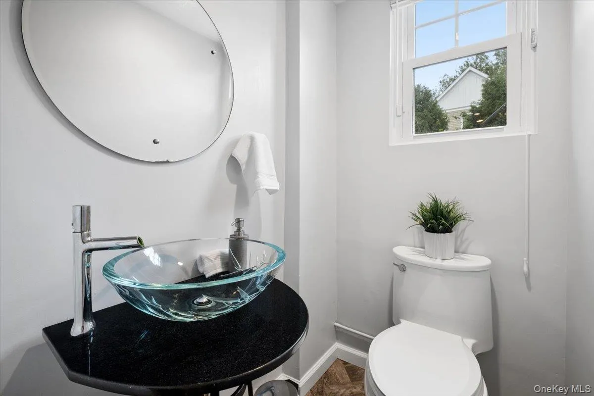 Powder room on lower level. Powder room on lower level.