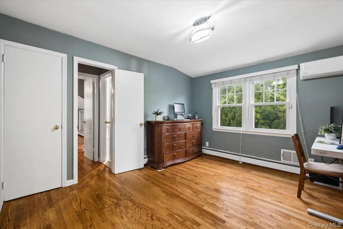 Fifth bedroom near primary bedroom, shown here as an office. Fifth bedroom near primary bedroom, shown here as an office.