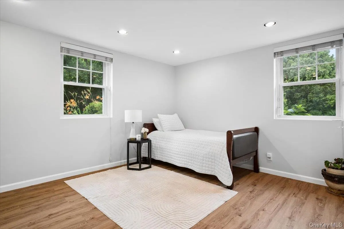 Recreation room on lower level, shown here with a bed but can be used as needed. Recreation room on lower level, shown here with a bed but can be used as needed.