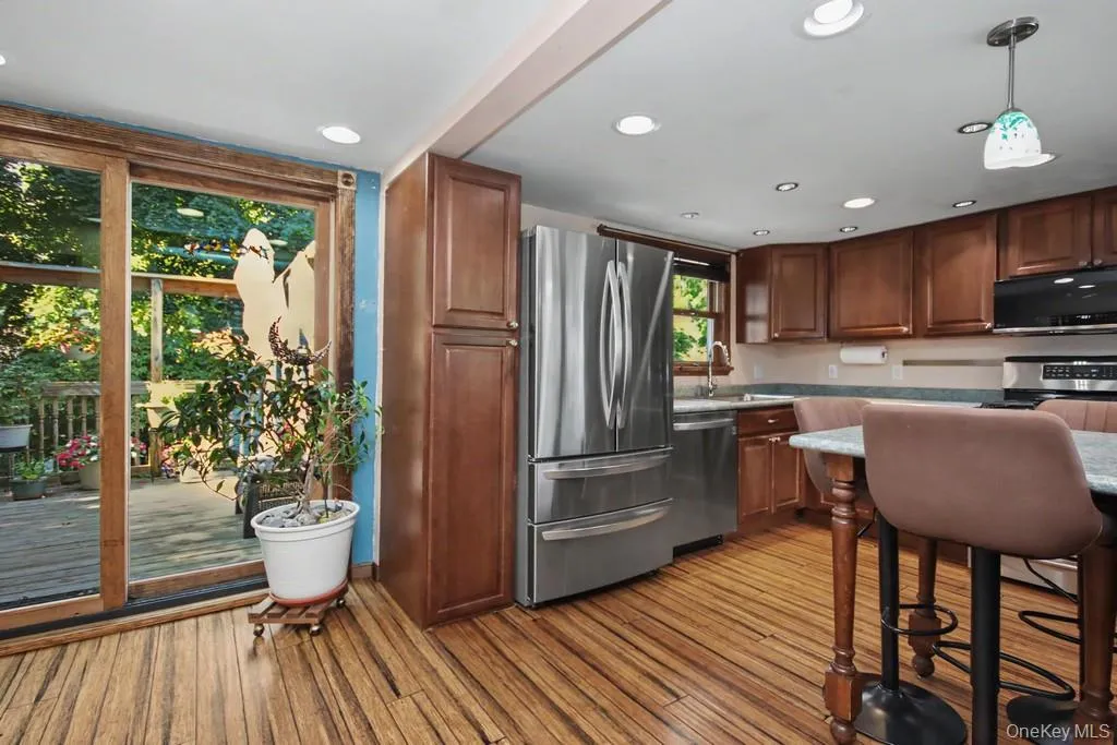 kitchen/dining with doors to deck kitchen/dining with doors to deck