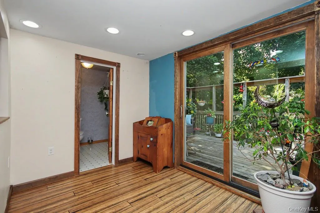dining area/door to deck and door to half bath dining area/door to deck and door to half bath