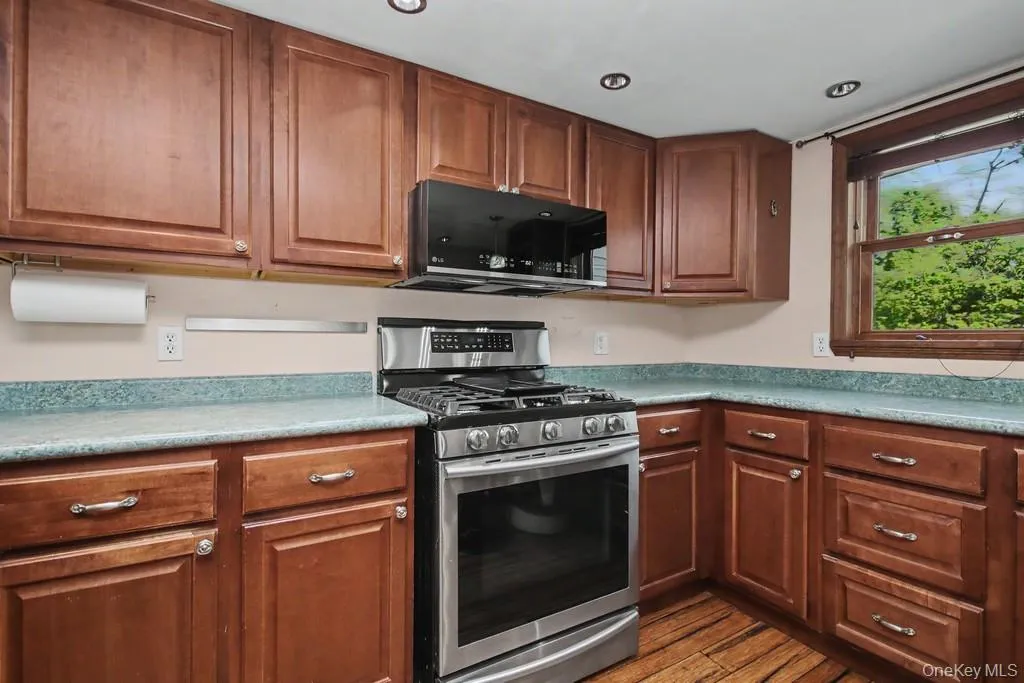 updated kitchen with stainless steel appliances and recessed lighting. updated kitchen with stainless steel appliances and recessed lighting.