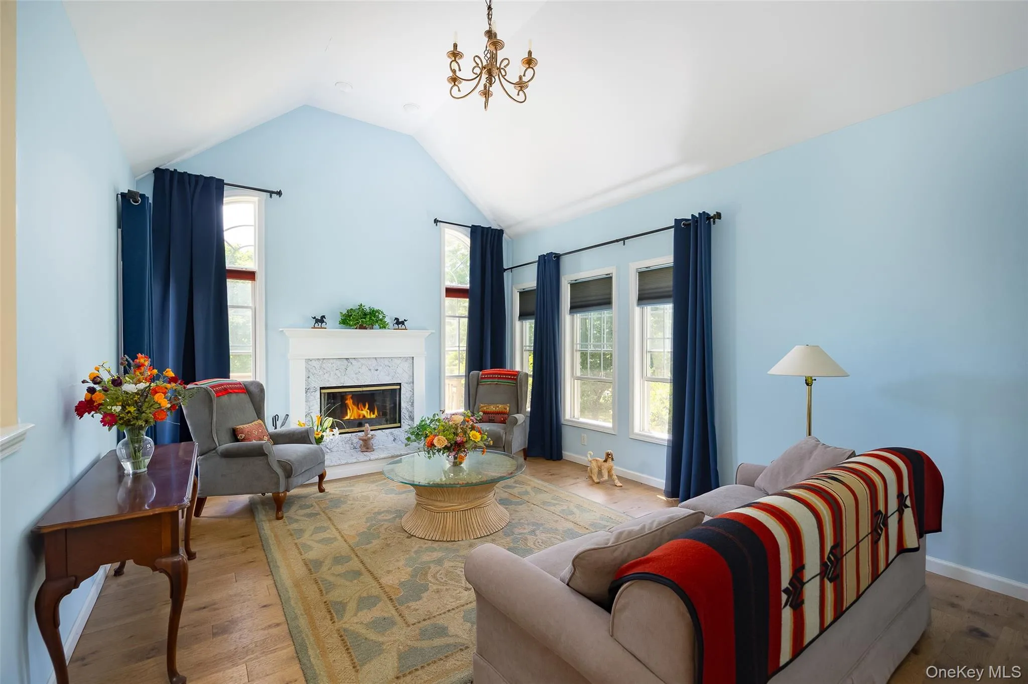 Family room with wood burning fireplace. Family room with wood burning fireplace.