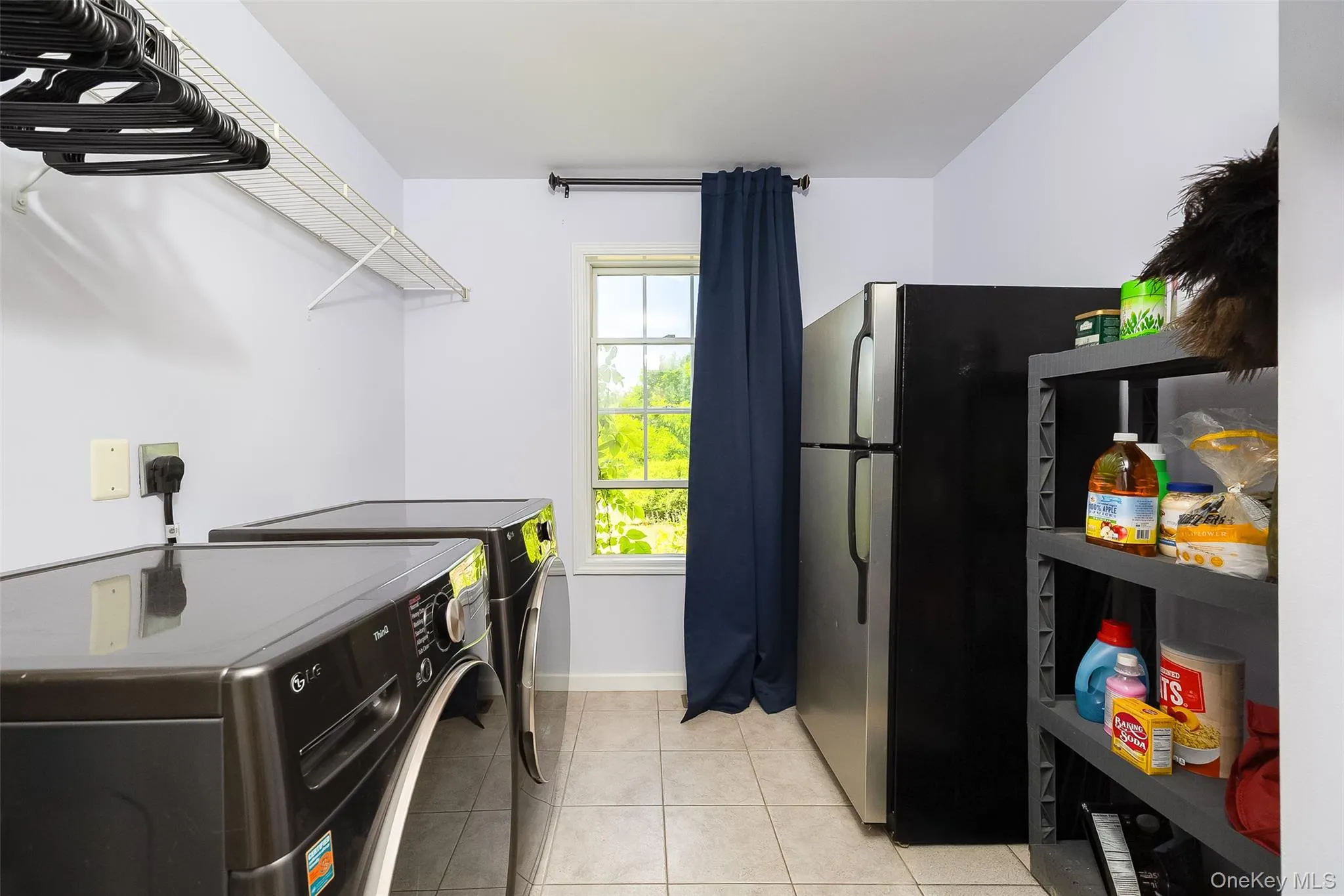 Pantry/laundry located off kitchen. Pantry/laundry located off kitchen.