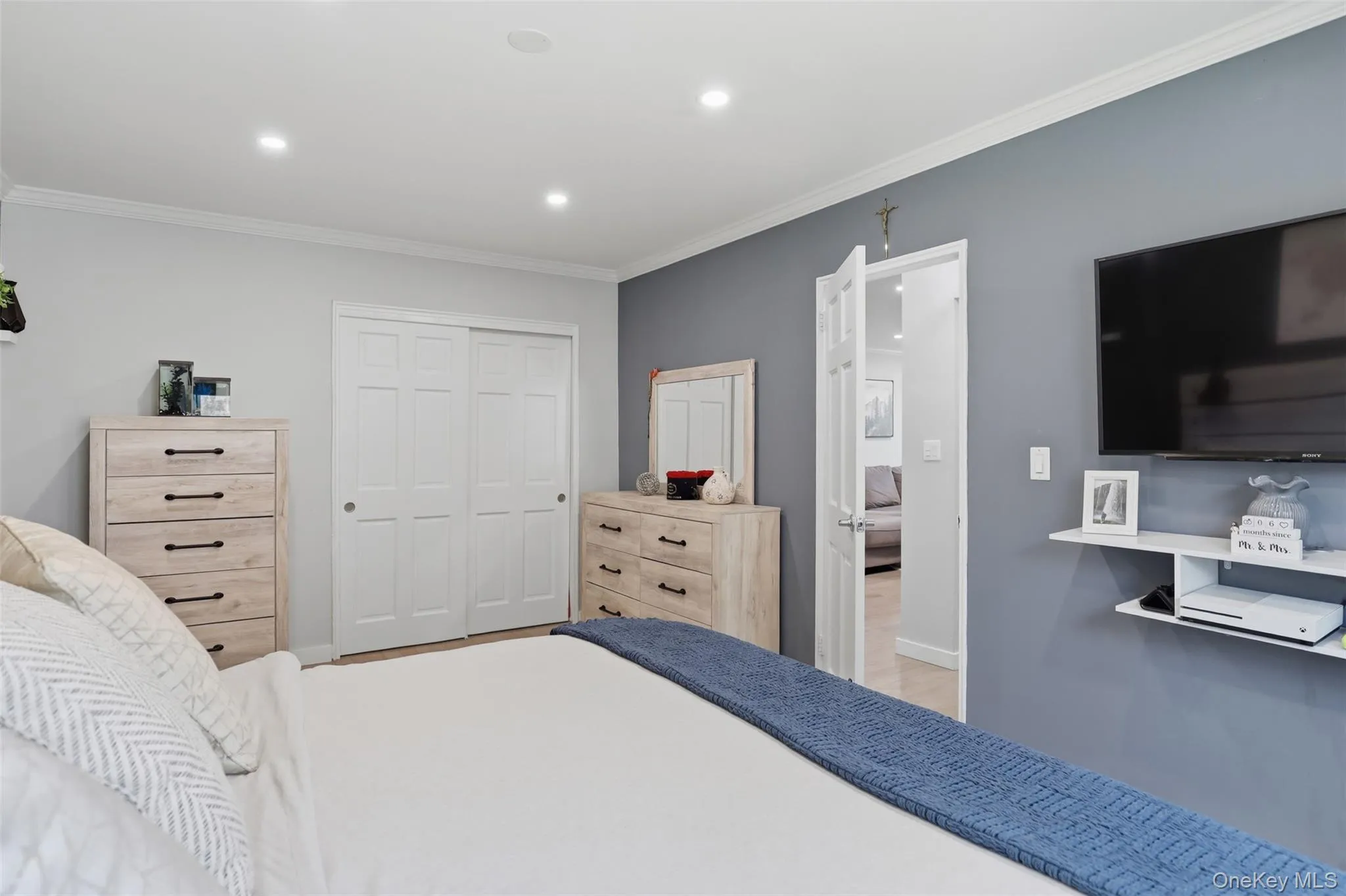 Spacious bedroom with large closet and plenty of natural sunlight Spacious bedroom with large closet and plenty of natural sunlight