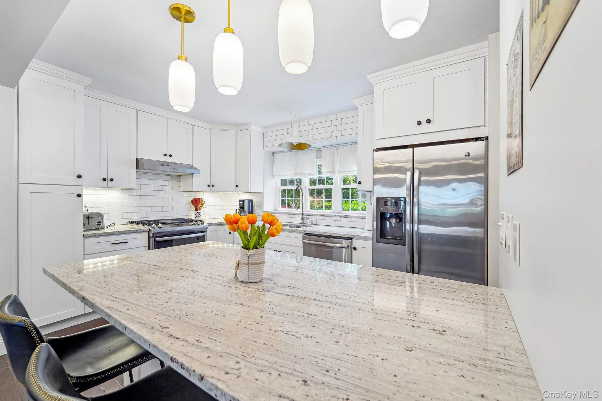 updated kitchen with ample cabinetry and SS appliances updated kitchen with ample cabinetry and SS appliances