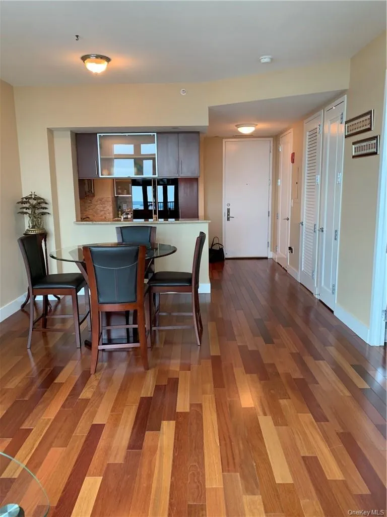 Dining room with dark hardwood / wood-style floors Dining room with dark hardwood / wood-style floors