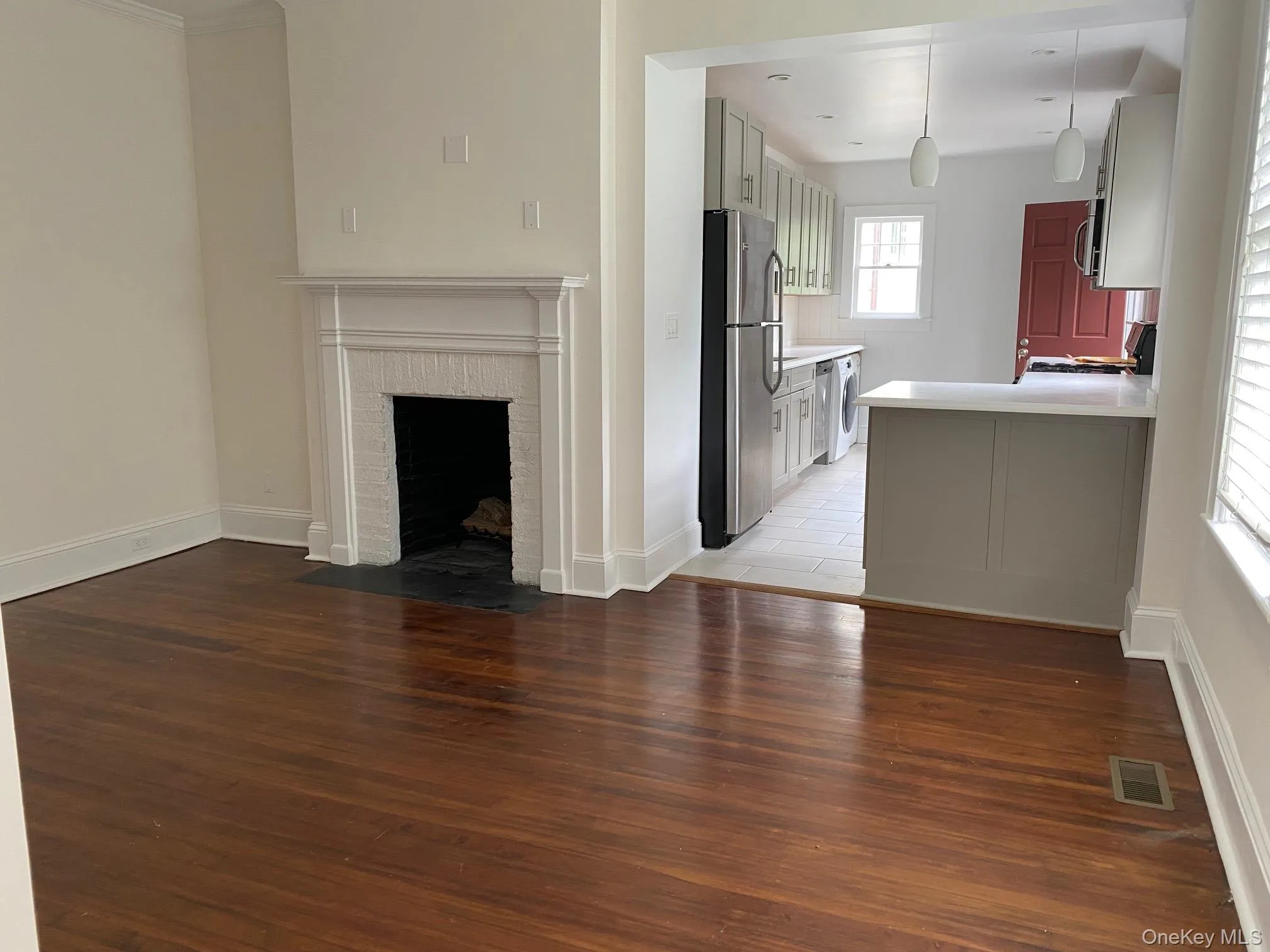 living room leading to kitchen living room leading to kitchen