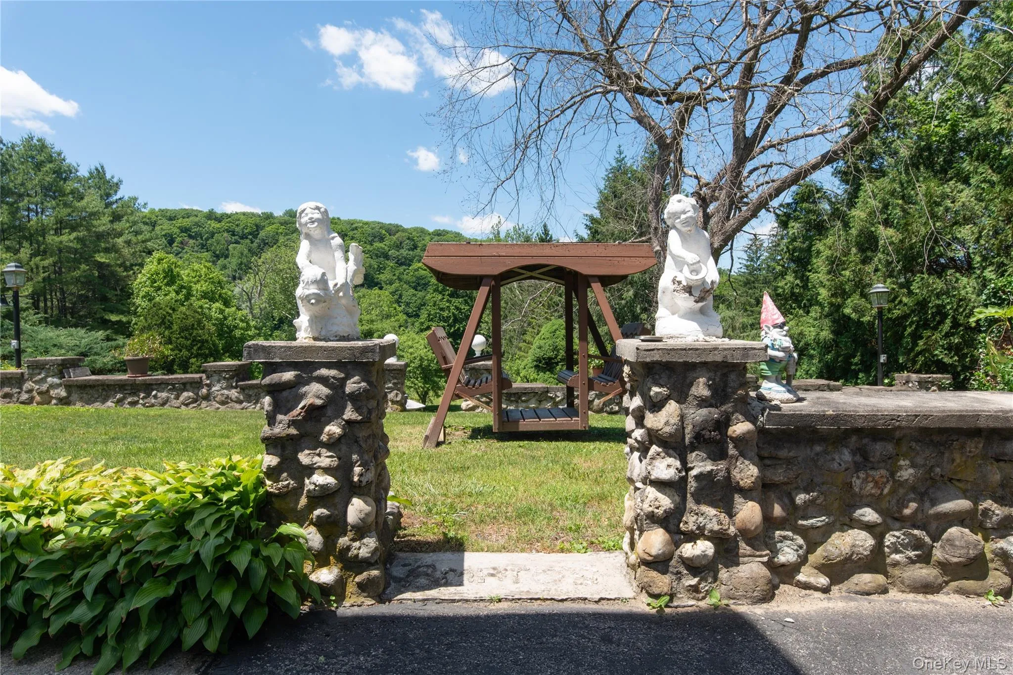 Stone Pillars to Swing and Backyard. Stone Pillars to Swing and Backyard.