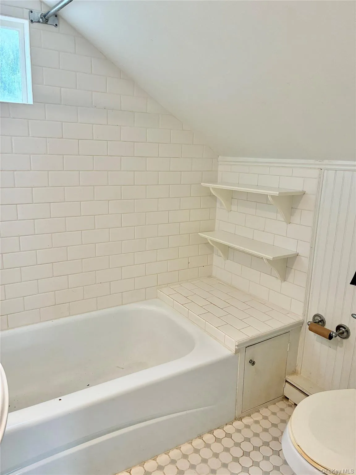 Tiled tub surround and floor Tiled tub surround and floor