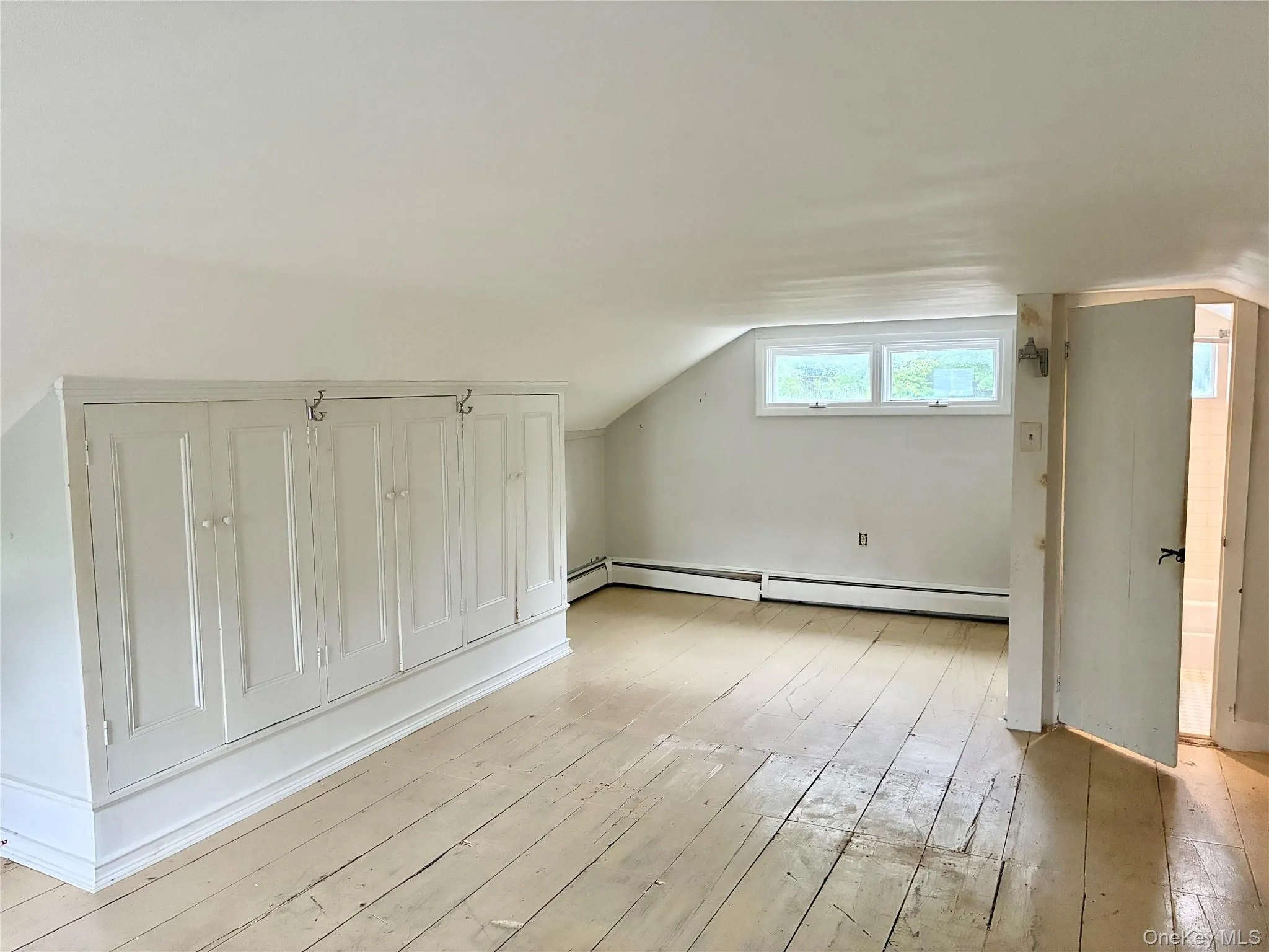 Built-in closets. Sitting area and door to bathroom Built-in closets. Sitting area and door to bathroom