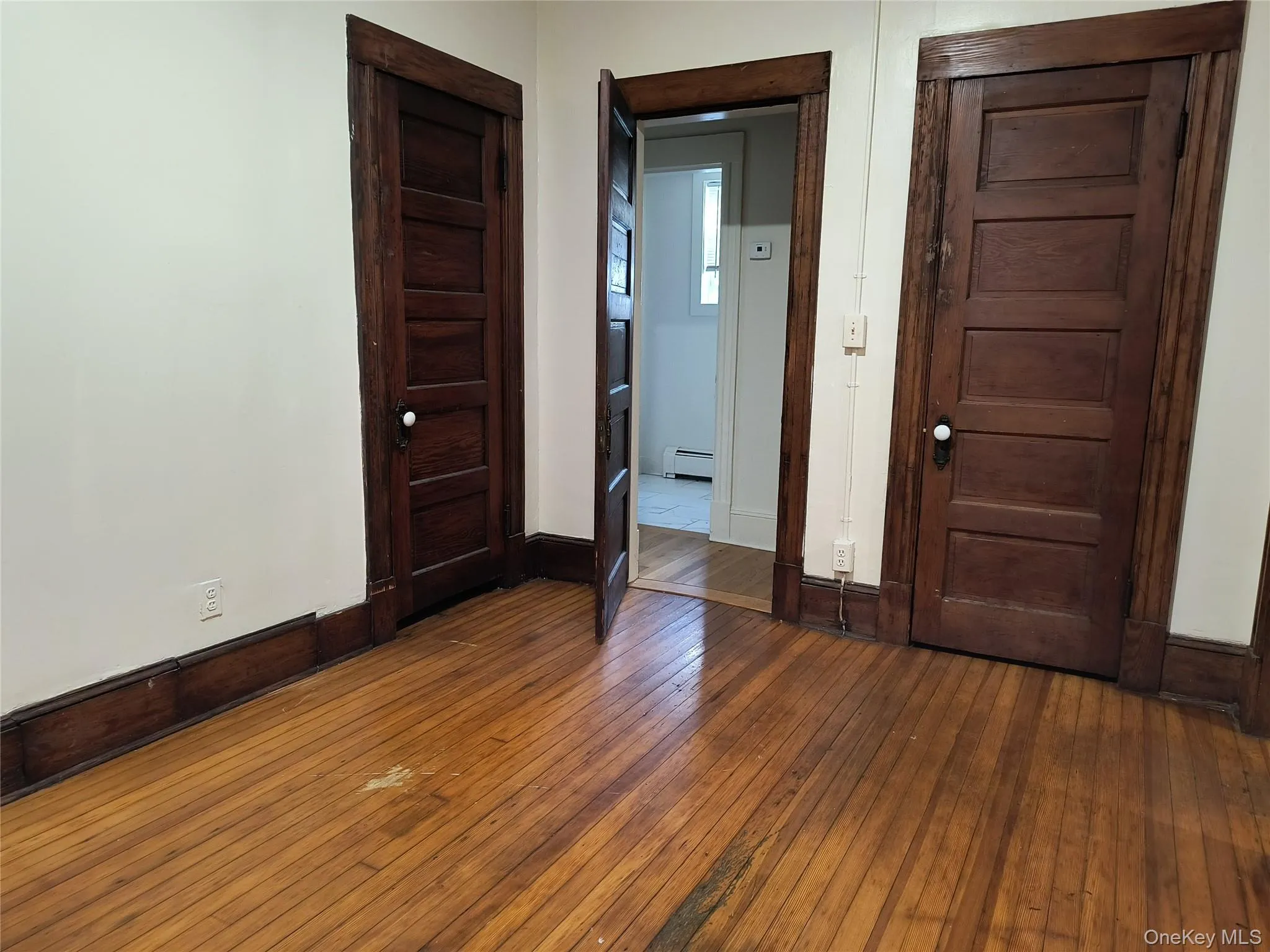 This is the smaller bedroom with 2 closets This is the smaller bedroom with 2 closets